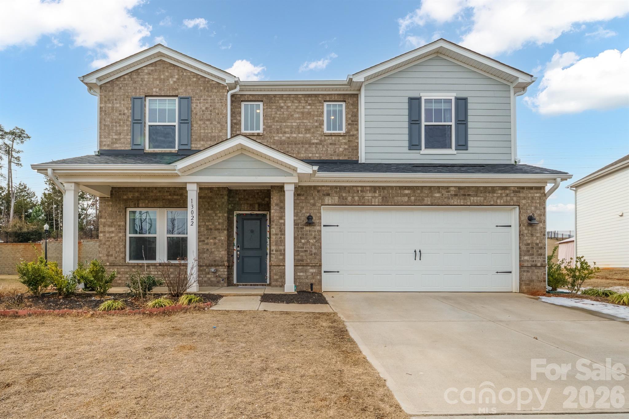 Nearly new (2022), this 5-bedroom home sits on a rare 0.47-acre lot, offering over 3,000 sq ft designed for today’s lifestyle within 15 Minutes to CLT Airport.

Welcome to 13022 Kenworth Rd — a 2022-built, move-in-ready modern living on one of the premium largest corner lots in the community. Located in the highly desirable Steele Creek area, this property blends luxury, space, and convenience in a way few homes can match.
Step inside to an open-concept main level filled with natural light and designed for effortless entertaining. The gourmet kitchen features a large island, quartz counters, stainless steel appliances, double wall ovens, and an upgraded ventilation system — perfect for everyday cooking or hosting gatherings. The spacious living and dining areas flow seamlessly, creating a warm, inviting atmosphere.
A main-floor bedroom with a full bath provides ideal flexibility for guests, multi-generational living, or a private home office. Upstairs, the expansive primary suite offers a true retreat with a large walk-in closet and spa-inspired bath. Three additional bedrooms, a versatile loft, and an upper-level laundry room with premium front-loading washer and dryer complete the second floor.
The outdoor space is a standout feature. Sitting on nearly half an acre, the oversized backyard offers endless possibilities — from a future pool to a garden oasis or outdoor entertainment area. The two-car garage provides ample storage and convenience.
Located just minutes from Charlotte Douglas International Airport, the Charlotte Premium Outlets, McDowell Nature Preserve, Lake Wylie, Carowinds, top-rated schools, and major employers, this home delivers the perfect balance of peaceful suburban living and city accessibility.
With its modern construction, premium upgrades, flexible floor plan, and exceptional lot size, this property is a rare opportunity in one of Charlotte’s fastest-growing corridors. Schedule your tour and experience the lifestyle this home offers.