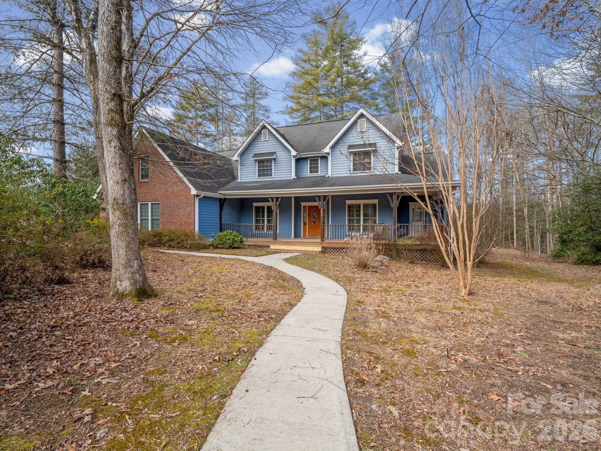 Settle into this welcoming 4-bedroom, 3-bathroom home featuring a spacious bonus room. Nestled on a wooded lot in the gated Jonathan Creek Estates, the property offers a comfortable amount of privacy while keeping you connected to the neighborhood and just moments from Etowah Golf Course. It’s a wonderfully walkable area, with a sidewalk leading directly from the home to the community pond, gazebo, and walking path.
Inside, timeless hardwood floors guide you through an open, light-filled floor plan. The chef’s kitchen serves as a true centerpiece, featuring sleek granite countertops, a premium gas cooktop, and a cozy breakfast room anchored by its own fireplace—one of two in the home. Relax by the fire in the expansive living room, or step out to the screened-in porch to enjoy the soothing sounds of the creek running along the rear property line.
The versatile layout offers ample room for everyone, featuring two bedrooms and two bathrooms on the main level, plus two additional bedrooms, a third bath, and a bonus room upstairs. The three car garage and walk in attic space allows for plenty of additional storage. Designed for year-round reliability, this home ensures total peace of mind with a whole-house generator, gas cooking, and dual fireplaces—keeping you comfortable and secure no matter the weather.