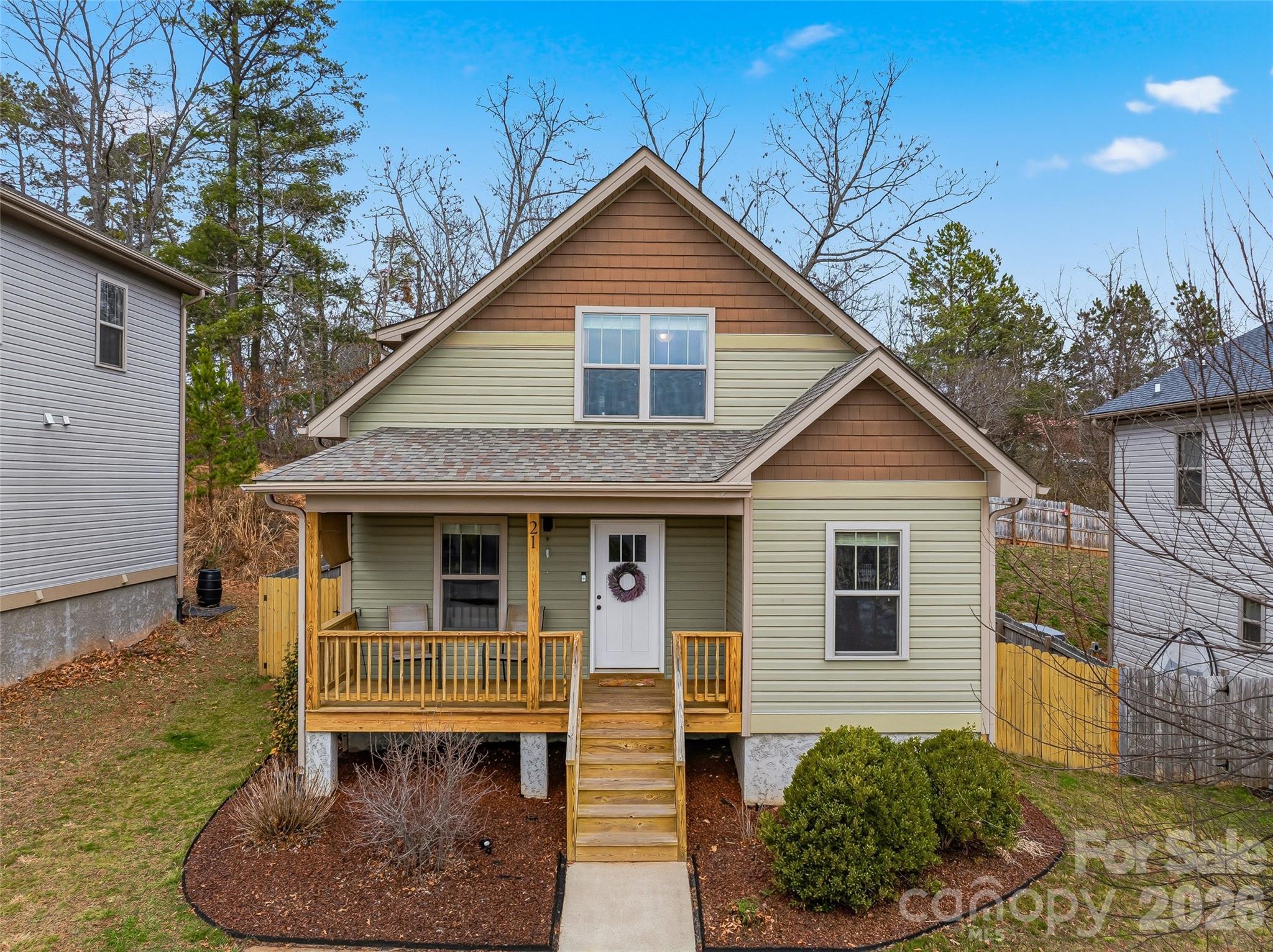 This well-maintained 4-bedroom, 2.5-bath is less than a mile from the heart of downtown Weaverville. The neighborhood features city-maintained streets and sidewalks with easy access to local shops, restaurants, cafés, and breweries, and mountain views from the end of the cul-de-sac. The main level features a comfortable living room, dining area, and a bright kitchen with stainless steel appliances. Also on the main floor are the primary suite overlooking the backyard and an additional bedroom that works well as a guest room, office, or flex space. Upstairs are two more bedrooms, a shared bathroom, and a convenient laundry closet. Outdoor living is easy with a covered front porch and a back deck overlooking the fenced yard—ideal for pets, gardening, or relaxing. With a sensibly sized yard, low-maintenance upkeep, and convenient access to I-26 and downtown Asheville (less than 15 minutes away), this home offers the perfect blend of comfort, convenience, and lifestyle. While the property has not been operated as a short-term rental, other homes in the neighborhood have been successfully used as vacation rentals. Sellers are willing to sell the home fully furnished, offering a turnkey opportunity for investors or second-home buyers.