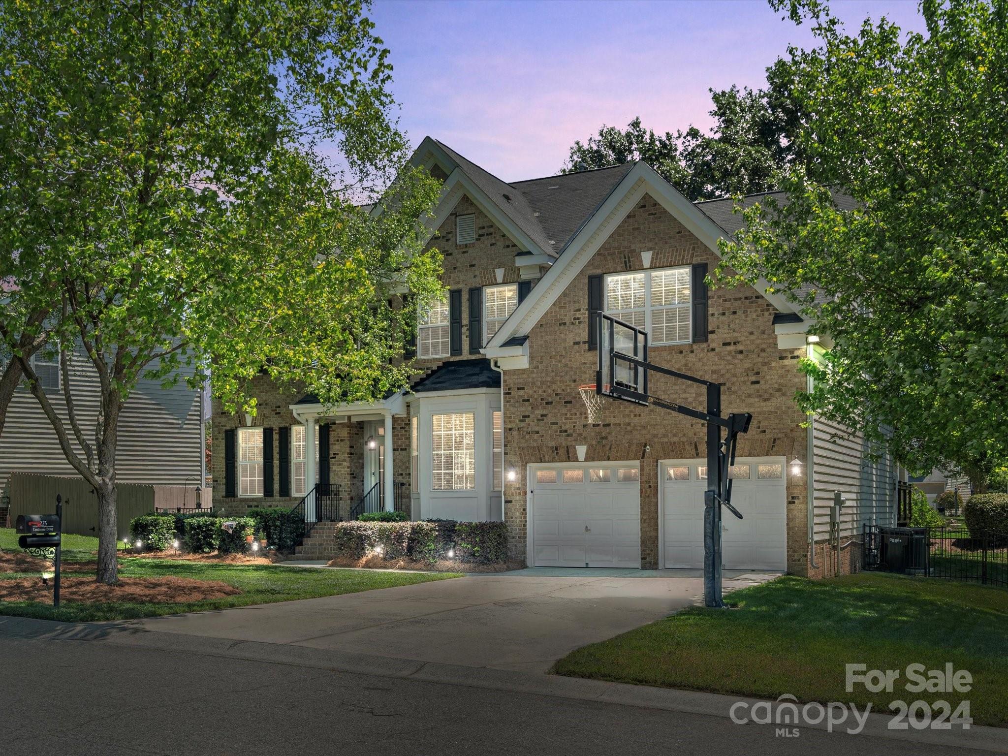 This 6 BR home has it all! Situated close to the interstate & shopping makes it easy to get anywhere quickly. H/W floors greet you & continue into lovely dining room w/bay window. Opposite of that is a huge office. Sought after bedroom on main w/full bath is ideal for guests or in-law suite. Open floorplan. Stunning brick detail around the fireplace in the 2 story great room captivates you & tall windows allow for tons of natural light. Gorgeous kitchen w/warm toned cabinetry features generous size island, corner pantry, double ovens & coveted window sink plus large breakfast. Upstairs you'll find 5 more BRs or 4brs plus bonus. Catwalk overlooks great room continuing that open, airy feel. Primary BR boasts tray ceiling & spa like bath w/garden tub & shower. Outside you'll find oversized, updated deck overlooks the flat, fenced backyard w/mature trees. Main floor ac/furnace (2023), Upstairs AC (2018) New crawl space vapor barrier, interior drain, sump pump (2022), Gutter Guards (2021).