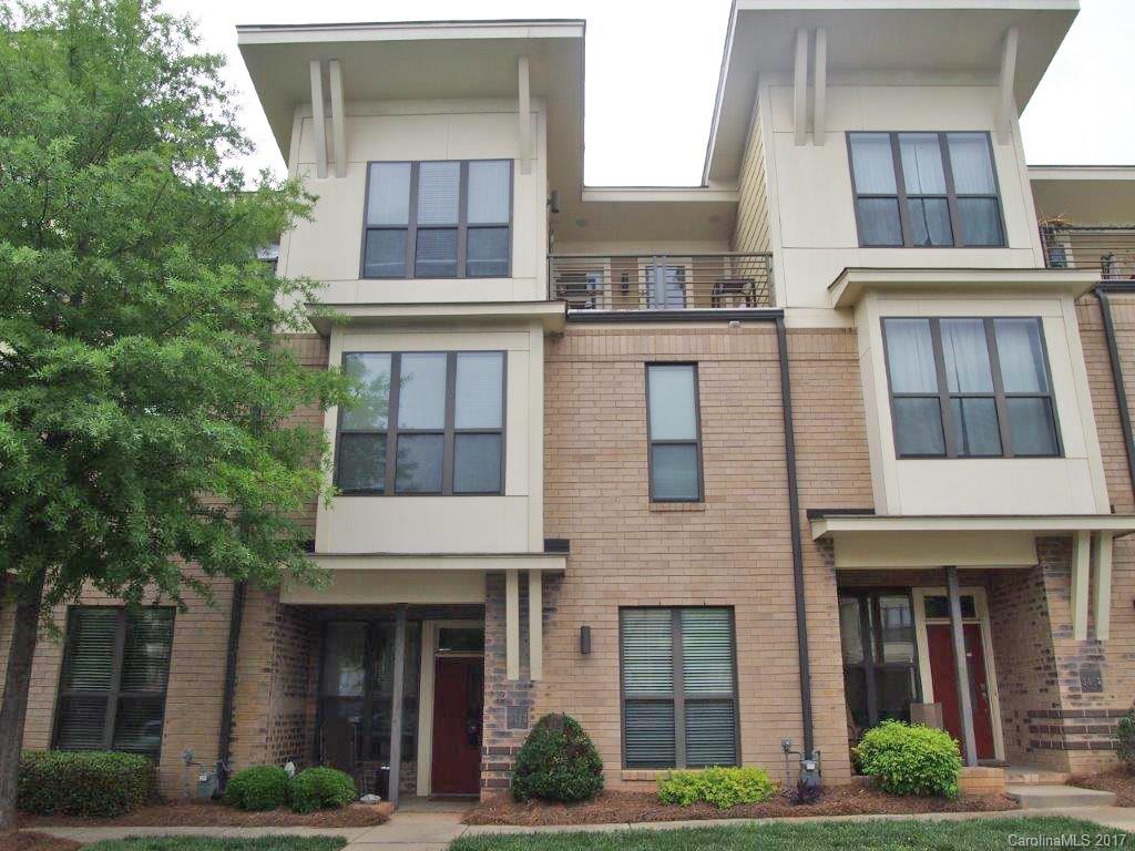 This beautiful, hard to find 3 bedroom is in the heart of NODA.  The open kitchen has stainless and granite, 1 master bath has a separate shower and tub with granite counters and double bowls, 2nd master has shower/tub combo with granite counters and double bowls and opens to the roof-top terrace, tankless hot water and fenced patio are just a few of the homes features. Within walking distance to NoDa restaurants, entertainment, coffee shops, and future light rail stop.