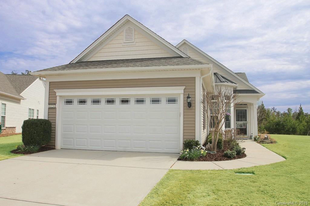 Premium Location in Sun City — Walking Distance from The Lake House & Shopping Center! Gray Myst w/ Sunroom, Three Season Room, & Paver Patio. Hardwoods Throughout! Foyer leads to Spacious Great Room & Formal Dining Area. Kitchen w/ Gas Appliances, Built In Desk, Custom Tile Backsplash, & Breakfast Nook. Sunroom Sliding Doors lead to Three Season Room. Paver Patio w/ Retractable Awning & Private View. Owner’s Suite & Private Bath w/ Heat Lamp, Dual Sinks, Shower, & Oversized Walk-In Closet.