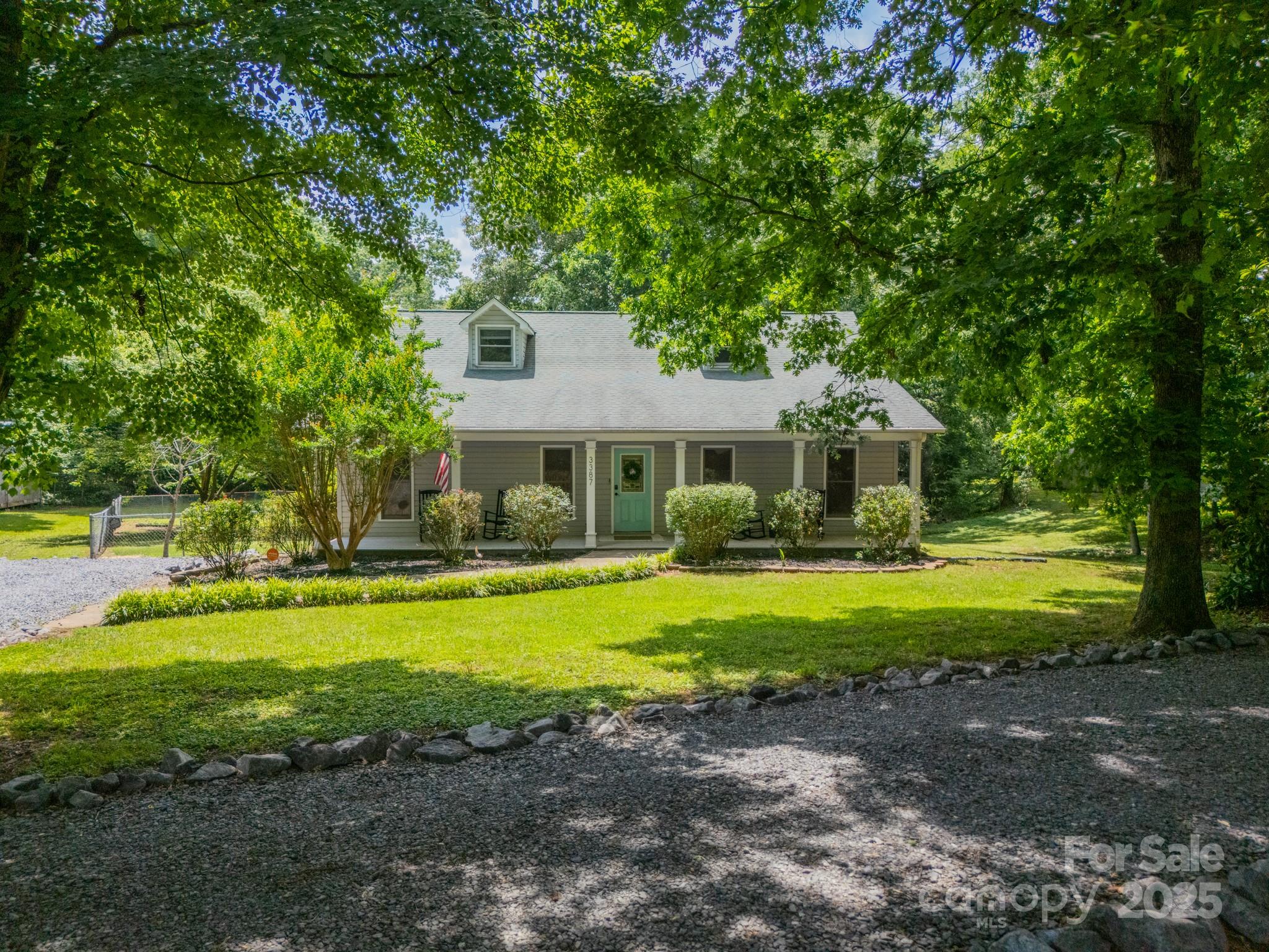 Tucked away on nearly 7 acres of private land, this 5-bedroom, 3-bathroom custom home is the retreat you’ve been waiting for. With real hardwood floors throughout most of the main floor, this home is full of character with the space you need—inside and out. 

Head outside, and the possibilities are endless. A huge backyard begs for everything from soccer games to garden parties, while a detached building next to the home offers extra space for a workshop, studio, or storage. At the rear of the property, a peaceful stream runs alongside a cozy firepit area, making it the perfect spot to unwind and soak in your private oasis. 

If you’re looking for space, privacy, and a home with character, this is it. Schedule your showing today!
