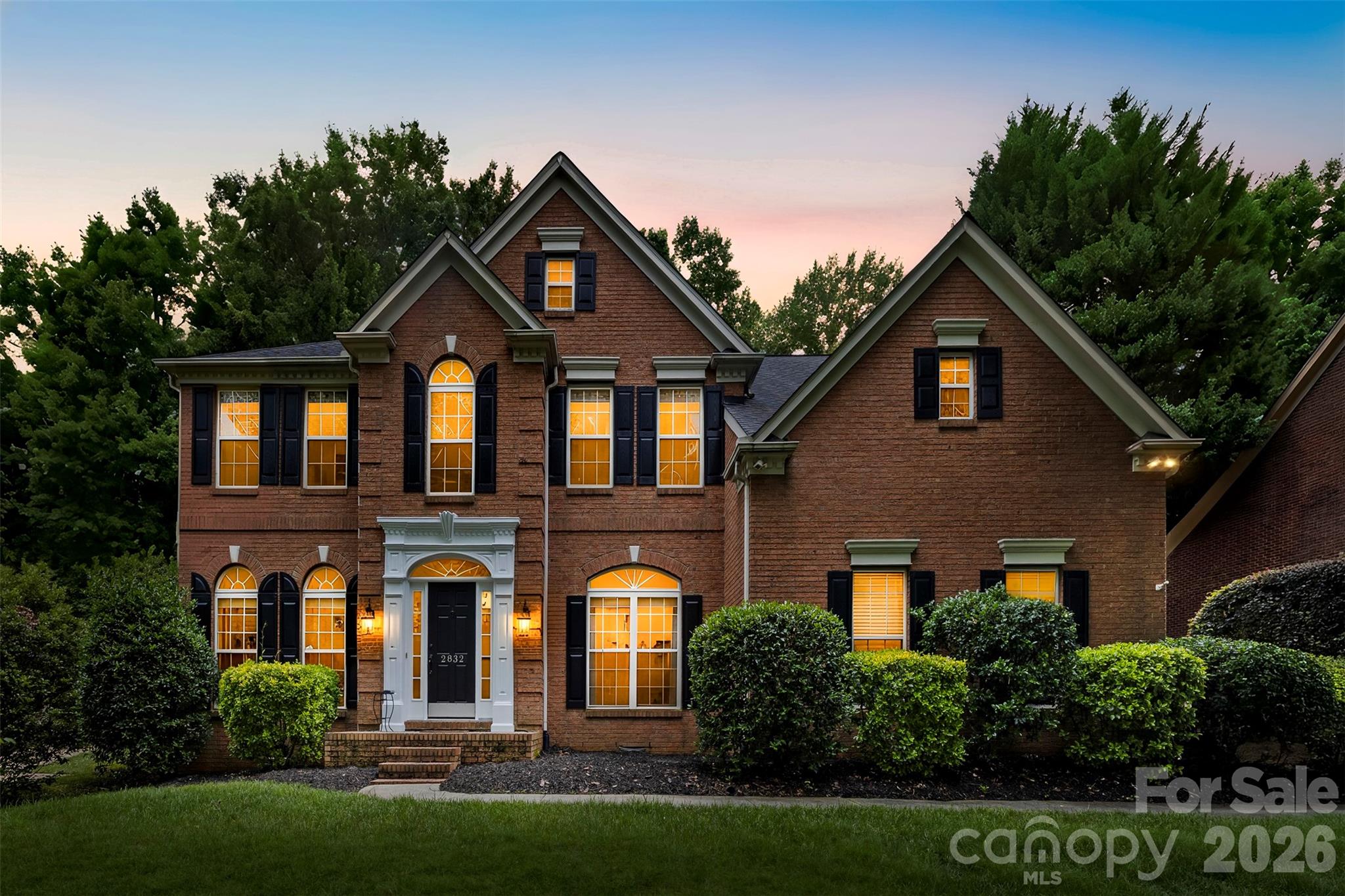 Welcome to waterfront community living in highly sought-after Mt Isle Harbor! Situated on a private, tree-lined ½-acre lot with no neighbors directly behind, this beautifully updated 5-bedroom, 2.5-bath home offers the perfect combination of space, flexibility, privacy, and lifestyle. Inside, you’ll find brand new carpeting throughout, fresh paint, updated lighting, and hardwood floors extending through the foyer, soaring two-story entry, living room, dining room, and main-level office. The renovated kitchen features white quartz countertops, designer backsplash, freshly painted cabinetry, updated hardware, farmhouse sink, abundant prep space, and a functional layout perfect for everyday living and entertaining.

The spacious floorplan includes a dedicated office on the main level plus an additional flex space located off the bonus room/5th bedroom staircase that could easily function as a gaming room, yoga studio, home gym, additional office, guest room, craft room, or playroom. The oversized primary suite and generously sized secondary bedrooms provide room for everyone to spread out comfortably.

Enjoy outdoor living year-round with the extra-large screened-in porch spanning the back of the home, plus an additional open deck area ideal for grilling, entertaining, or relaxing while overlooking the peaceful wooded backyard. Mature trees create a serene setting with exceptional privacy rarely found in neighborhood living. The property also includes a storage shed for added convenience.

Mt Isle Harbor offers an unmatched lifestyle with 3 community boat docks, boat ramp, boat storage, lake access, tennis and pickleball courts, soccer field, 2 playgrounds, clubhouse, community pool, lakefront picnic and grilling areas, plus neighborhood food truck events and social activities throughout the year. Conveniently located just minutes from I-485, Riverbend Village shopping and dining, approximately 25 minutes to Uptown Charlotte, and about 20 minutes to Charlotte Douglas International Airport. This home offers the perfect blend of peaceful lake community living with easy access to everything Charlotte has to offer.