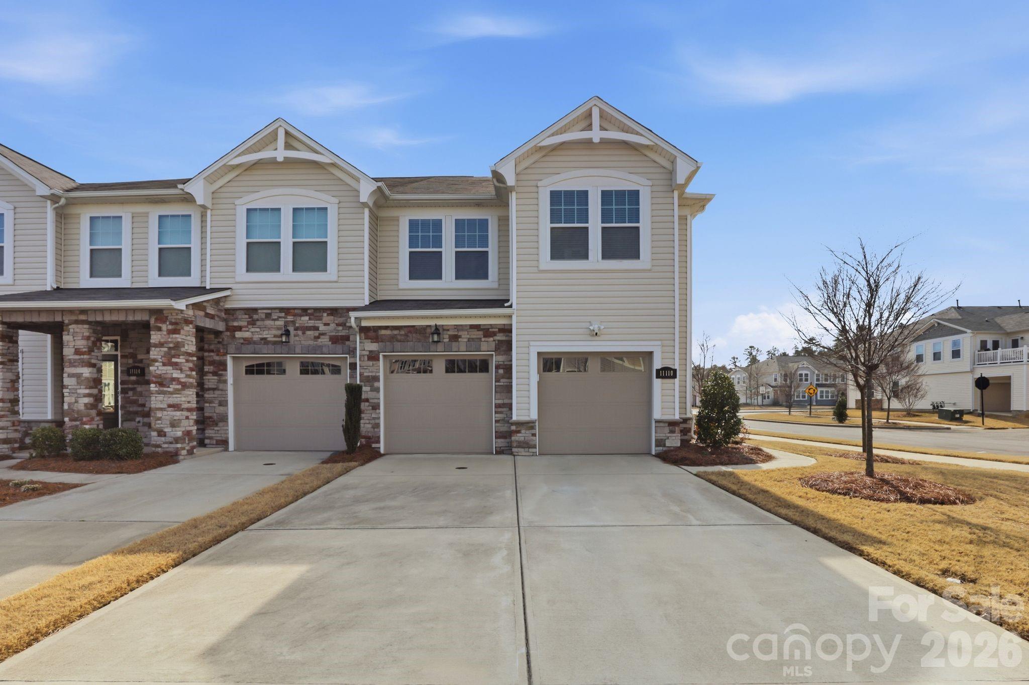 Welcome home to this stunning Mattamy-built townhome nestled in the sought-after Galloway Park community! From the moment you step inside, you'll be captivated by the open floor plan, luxury vinyl plank flooring, and a gourmet kitchen featuring granite countertops, stainless steel appliances, and a gas range perfect for the home chef. The spacious primary suite boasts a tray ceiling, walk-in closet, garden tub, and tiled shower — your personal retreat at the end of every day.  The front-facing 2-car garage offers easy access and excellent curb appeal. Located minutes from I-485, UNC Charlotte, Concord Mills, Trader Joe's, Harris Teeter, and top dining — this is Charlotte living at its finest. Don't miss your opportunity!