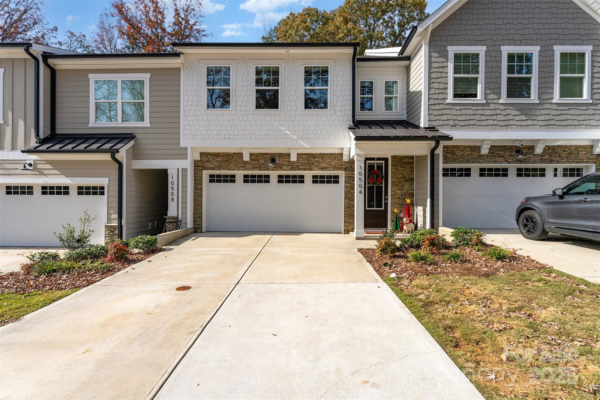 Lake Living at its finest!! Welcome Home! This luxurious newer construction Cornelius town home offers premium finishes throughout, including upgraded Quartz countertops in the kitchen, marble in the bathrooms, and LVP flooring. All rooms have motorized/remote blinds and motorized black out blinds in the primary. Enjoy the beautiful screened porch, perfect for relaxing or entertaining. The spacious open floor plan features 4 bedrooms, 3 full baths, a loft flex space upstairs, and a 2-car garage. Wonderful modern kitchen includes Stainless appliances, large island, and large pantry with built-in shelving. Drop zone near entryway, light and bright and so much more to love. Maintenance-free backyard backs up to mature trees for added privacy. HOA has a great Dog Park close by as well. Walkable to local restaurants and small businesses. Just minutes from Lake Norman with low HOA dues. Zoned for highly regarded Charlotte-Mecklenburg Schools, this home combines convenience, style, and location! All HOA docs loaded. Floor Plan attached.