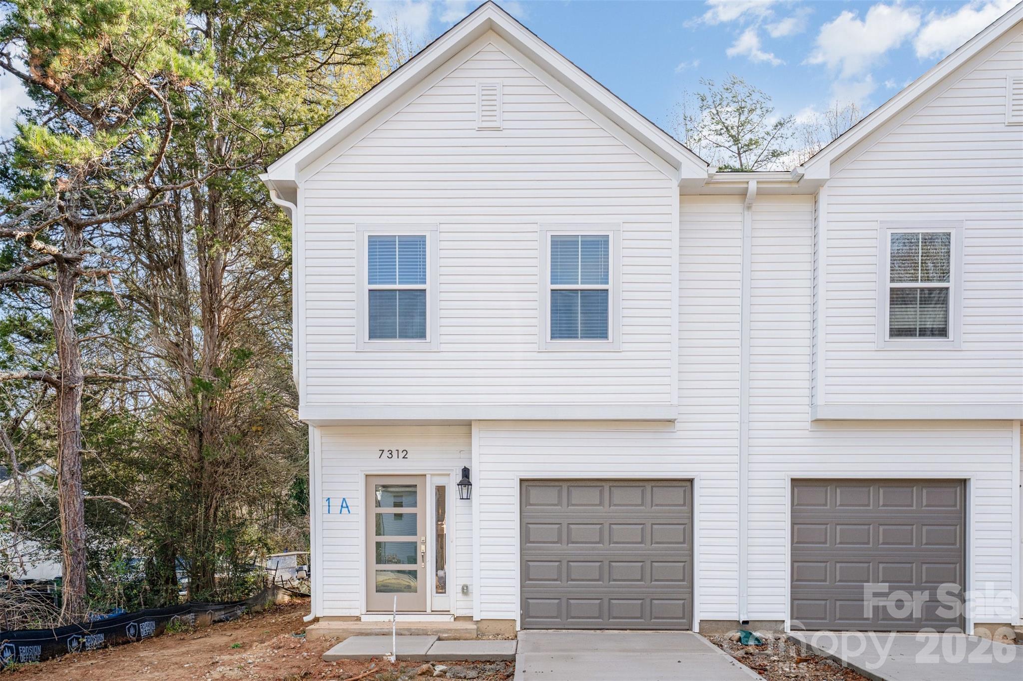 Beautifully crafted new construction townhome offering 1,700 square feet of modern, low-maintenance living. This 2-story home features 3 bedrooms and 2.5 baths with a thoughtfully designed open-concept main level, complete with contemporary finishes, abundant natural light, and a seamless flow ideal for both everyday living and entertaining. Upstairs, you’ll find a comfortable primary suite designed for relaxation, followed by well-appointed secondary bedrooms. With quality craftsmanship throughout and a clean, modern design, this home offers the perfect blend of style, function, and efficiency.