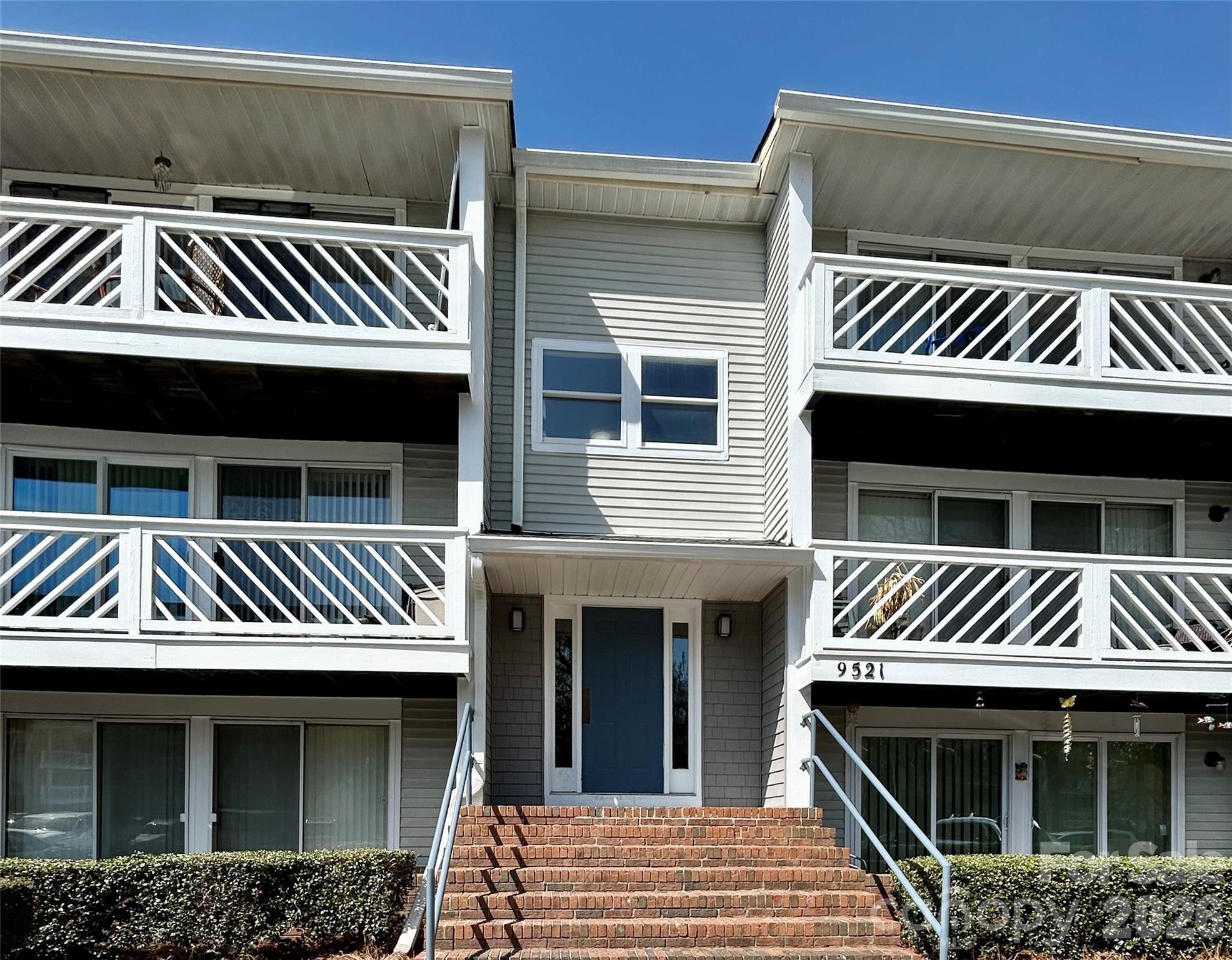 Fantastic opportunity at a great price! Prime location, just a short walk to UNC Charlotte campus, this 1st floor, 2 bed/2 bath condo is ready for its next occupants. New LVP flooring throughout and a fresh coat of paint has renewed the space to make it move in ready.  Also enjoy brand-new stainless-steel appliances in the open concept kitchen leading to a large living and dining space. Serenity awaits, with no neighbors behind, as the sliding glass doors bring in plenty of sunlight and lead out to your patio and green grass. Parking is available in the designated spot directly in front of the building, additional visitor parking is available. New water heater installed 03/2026. Washer and dryer included.