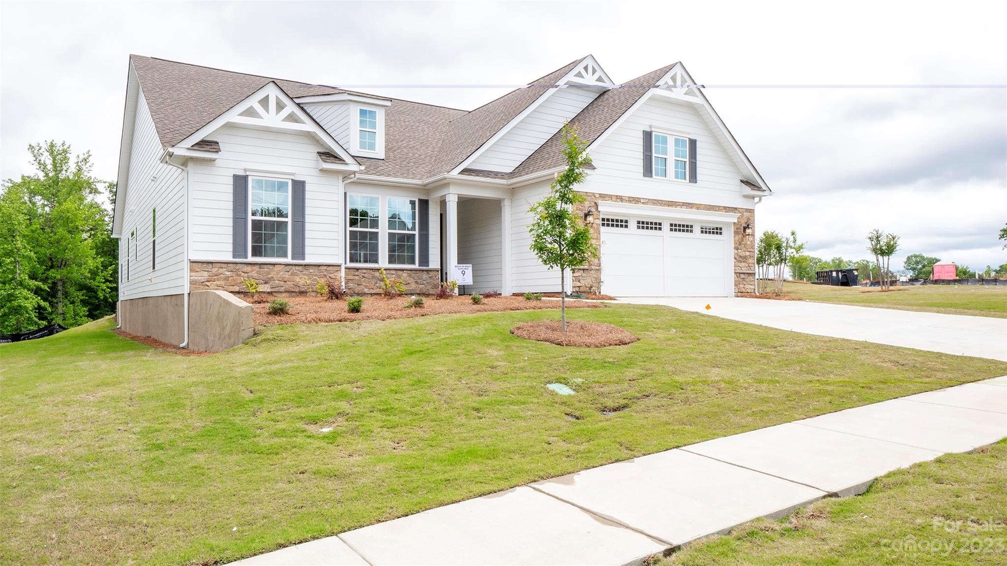**NEW CONSTRUCTION AVAILABLE FEB 2023** Located in the brand new gated 55+ community of The Gentry at Handsmill on Lake Wylie. Beautifully finished new construction with many highlights including a Finished Bonus Room with Full Bath and Walk-In Closet and Great Room Fireplace. The home sits on an oversized corner lot with woods behind. The chef in the family will appreciate the home's Gourmet Kitchen with GE Appliances, Gas Cooktop, upgraded cabinetry, Quartz countertops and Island. The floorplan flows well for large gatherings and is comfortable for everyday living. The Screened-Enclosed Lanai allows you to enjoy year-round outdoor living.