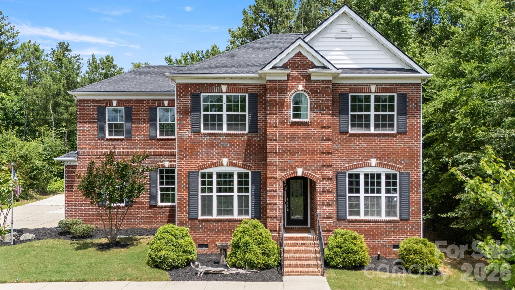 Looking for a beautiful all-brick home with no HOA, a fenced back yard and a pretty wooded setting? Welcome home! Nestled on a half acre, this well maintained 3-bedroom, 2.5-bath home offers the perfect blend of comfort, space and functionality. This home also has a 2 car side load garage. Inside, you will find a spacious floor plan featuring a large loft, a formal dining room, dedicated home office, great room with gas fireplace, and new upstairs carpeting. This fabulous kitchen is designed for both everyday living and entertaining, offering abundant cabinet space, granite countertops, a breakfast bar, and space for a breakfast table overlooking the backyard. The gas range is a chef's bonus. The open layout between the kitchen and great room creates an inviting space for gathering  and every day living. The spacious primary suite features a large walk-in closet. Primary bathroom offers a garden tub, and a separate shower. There is also a large loft upstairs. The secondary bedrooms are spacious! Convenient upstairs laundry room. Step outside and enjoy your own backyard oasis.  Relax on the deck(15x17), unwind on the gazebo(13x9), and take in the peaceful wooded backdrop. There is a large shed/workshop that measures (8x24). It has electric. The shed/workshop provides endless possibilities for storage hobbies or projects. Major updates include a newer HVAC system that is 4 years old. A new roof was installed in 2024. This well maintained home has been regularly serviced, recently inspected, and includes a transferable termite bond for added peace of mind. Conveniently located near shopping, dining, I-77 and every day conveniences while still offering a secluded feel, this move-in-ready home is a rare find. Upstairs has brand new carpet.
