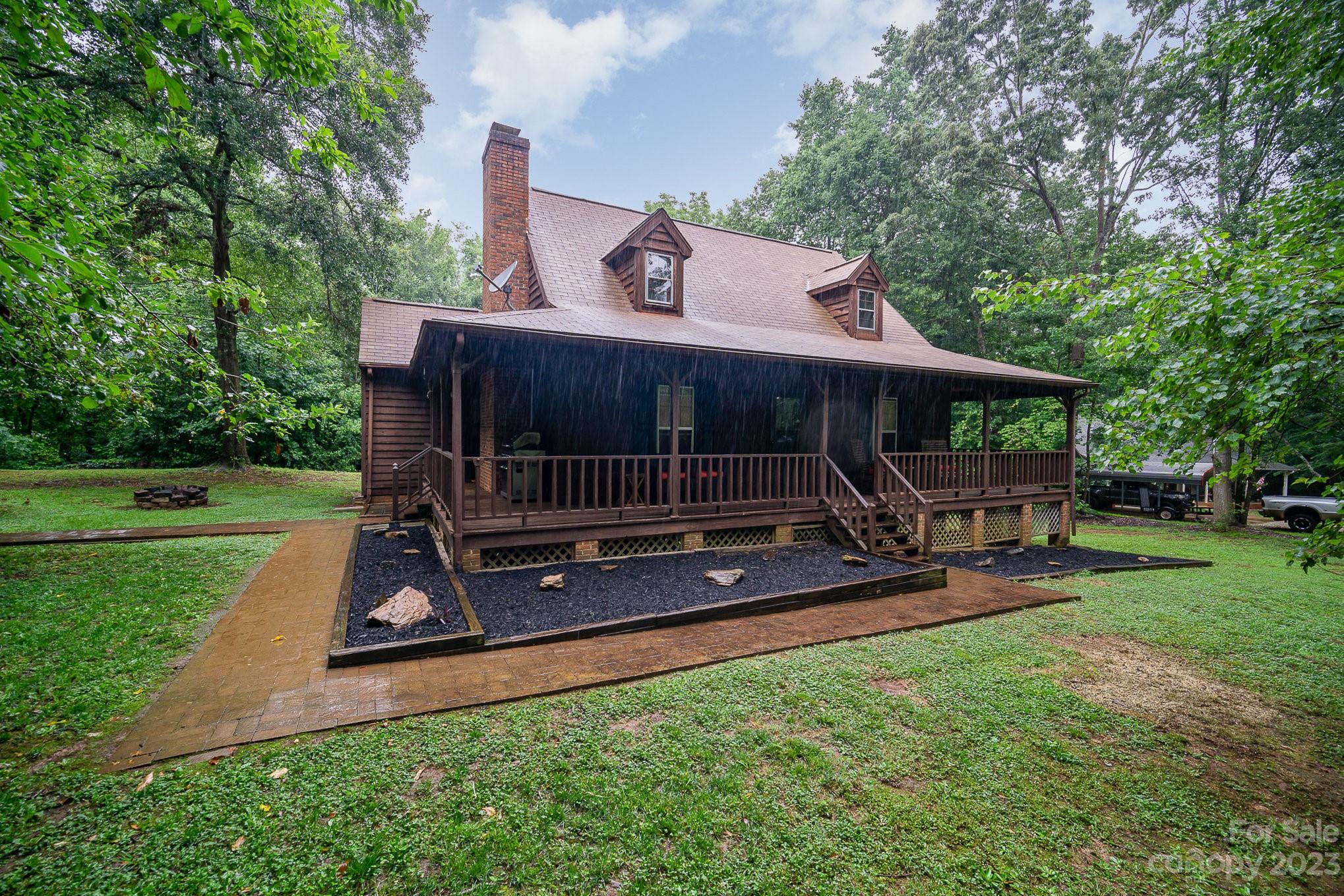 Welcome to 427 Laurel Hill Rd, a charming 3 bed 2 bath home nestled on a picturesque acre of land. Experience the enchanting cabin feel, complete with a pool that allows you to unwind and enjoy the outdoors. As you step inside, you'll be captivated by the cozy and inviting atmosphere that runs throughout the home. The living area features rustic accents and a warm color palette, creating a comfortable space to relax and entertain. Imagine cozying up by the fireplace on chilly evenings, creating memories that will last a lifetime. Indulge in a variety of dining options and the connivence of nearby retail centers, all within a short distance from your doorstep. Make sure to schedule a showing today!