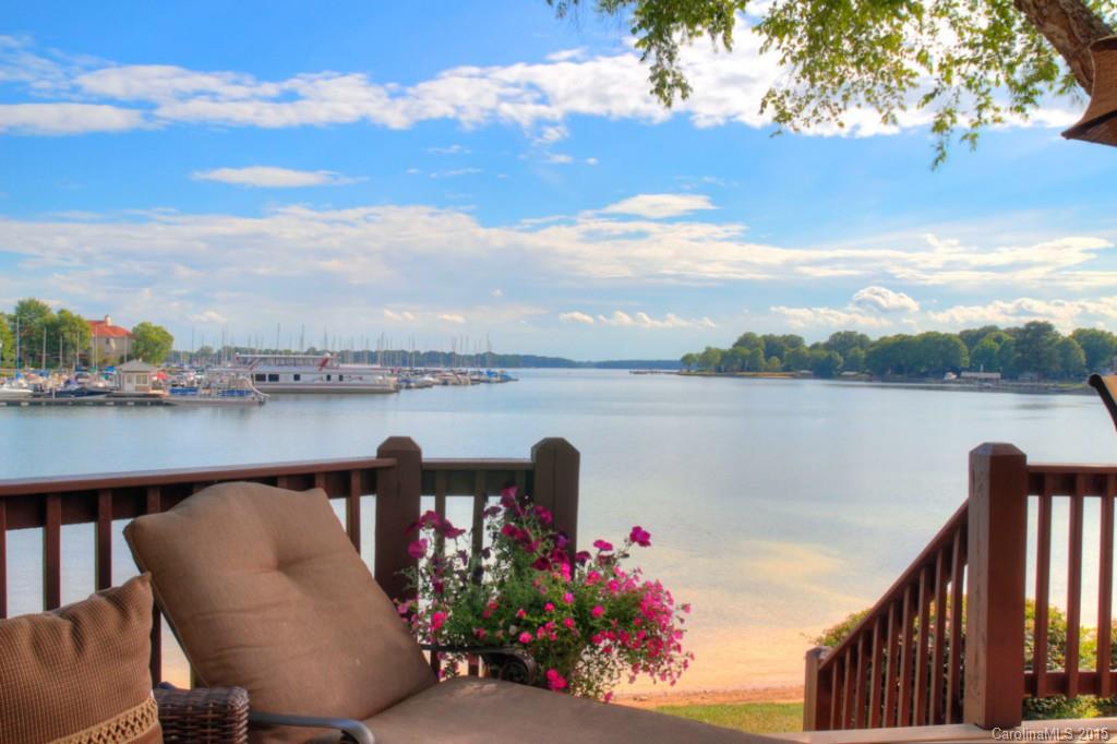 REDUCED JULY 4TH SPECIAL TO $449,000!!!!!Best View IMMUCULATE HURRY WILL NOT LAST LONG!!!  WATERFRONT TWO STORY TOWNHOME 1800 SQ FT  BOAT SLIP #39 AVAILABLE FOR ADDITIONAL $27,000 AT AQ PRIVATE MARINA.  TRUE HARDWOOD FLOORS ON MAIN LEVEL & UPPER LEVEL.   KITCHEN/GRANITE +STAINLESS STEEL WHIRLPOOL APPLICANCES 1.5 YEARS OLD. EXOTIC GRANITE ON WET BAR. FAUX PAINT, UPDATED MASTER BATH GRANITE/ NEW JETTED TUB/ SEAMLESS SHOWER DOORS/VANITY SHOWER SEAT/DECORATIVE TRAVERTINE TILE.    GUEST BATH UPDATED.