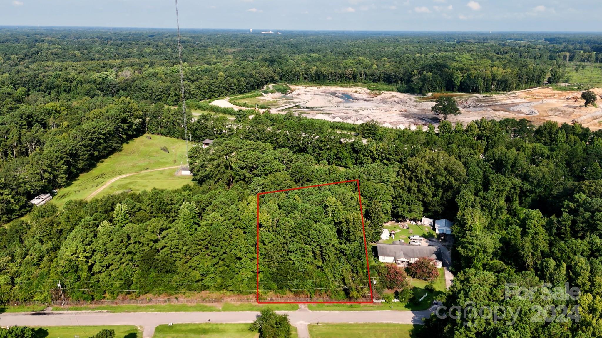 OWNER FINANCING AVAILABLE! This is a unique chance to own a .73-acre parcel, great for homeowners, investors, or developers. Situated in Florence, SC, but located in Darlington County where no zoning applies, this property offers limitless potential. Whether you're looking to place a mobile home, modular home, barndominium, or even start a small business, this lot has the flexibility you need! Completely untouched, this property presents an opportnuity to shape all aspects of your future homes layout and the timber on the property will allow you to recoup the some of your investment. This type of property is in high demand due to its amount of street frontage at 152 feet.