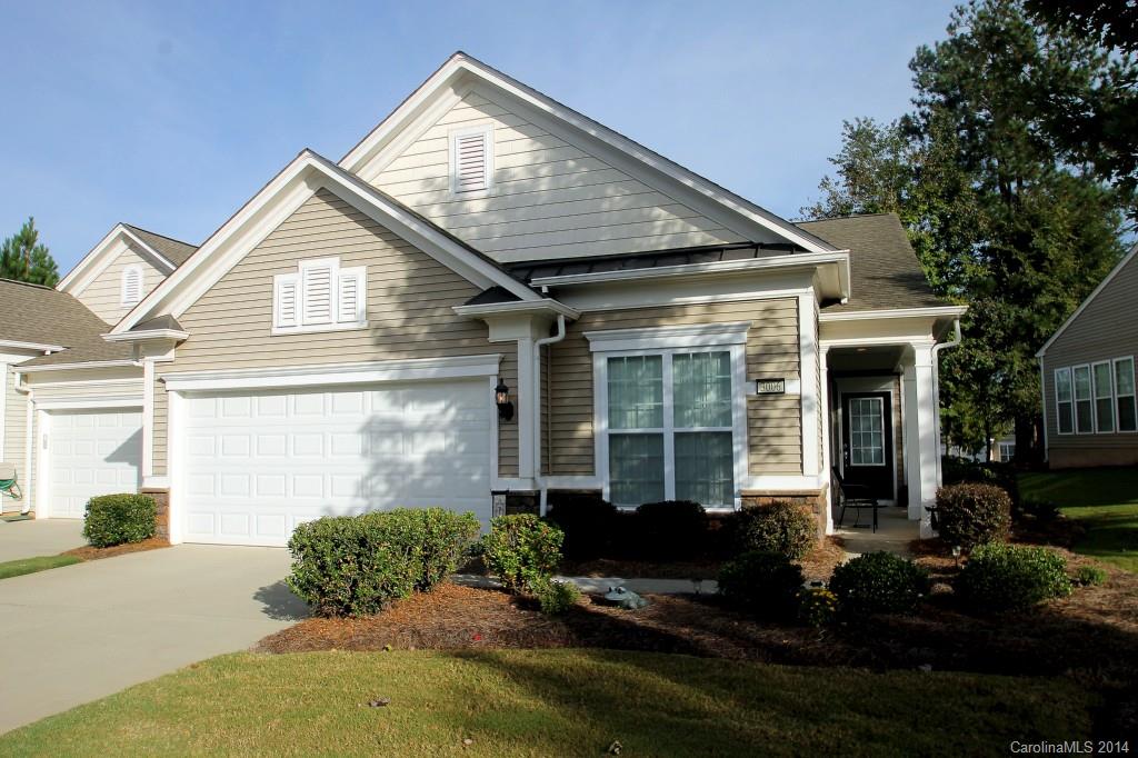Cozy 2 Bedroom / 2 Bathroom Muirfield Villa with Screen Porch! One Owner, Never Rented! Spacious Great Room with Fantastic Natural Lighting. Kitchen with Stainless Steel Appliances, Island, & Tile Flooring. Dining Room Leads to Screen Porch! Owner's Suite Features Private Bath with Dual Sinks, Shower, & Walk-in Closet. Guest Bedroom & Guest Bathroom. Foyer Leads to Library! Prime Location in SCCL! Walking Distance to Amenities & Carolina Commons Shopping Center.