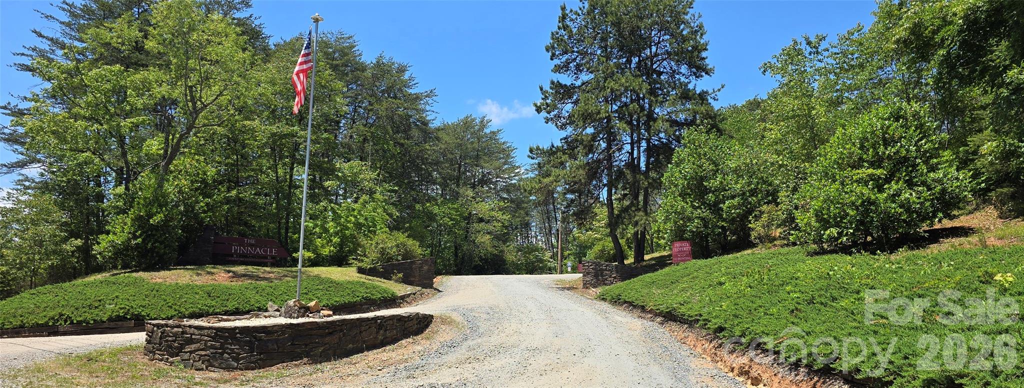 You will look far and wide for a land lot with long range views like this! Imagine watching the sunset with unobstructed 50 mile views!
Pinnacle Parkway is a private road in a wilderness community, with no hunting permitted, and an abundance of
wildlife and beauty. The property line begins roughly 0.94 acres from the community entrance. The lot has approximately 885 feet of road frontage.
The community is located with easy access to Lake Lure or Lake James, for a day of skiing in Boone, or special events in Charlotte just 1.5 hours away, and Asheville only being roughly 45 minutes away. You get the best of all worlds living above the clouds here! There is an HOA in place to ensure a peaceful setting for everyone and improving property values. Pinnacle Parkway is a privately maintained gravel road, AWD or 4WD vehicles are strongly encouraged.... [No drive-bys. No sign.] Mobile homes are not permitted, however modulars are. Min to build is 1,000 sq ft. Relaxed dining and shopping in Rutherfordton 20 minutes to the south, or Marion 20 minutes to the north. you will be far removed from noise and stress, all the while being able to have everything within arms reach. Please reach out to schedule your showing!
P.s... Drone images coming soon!
