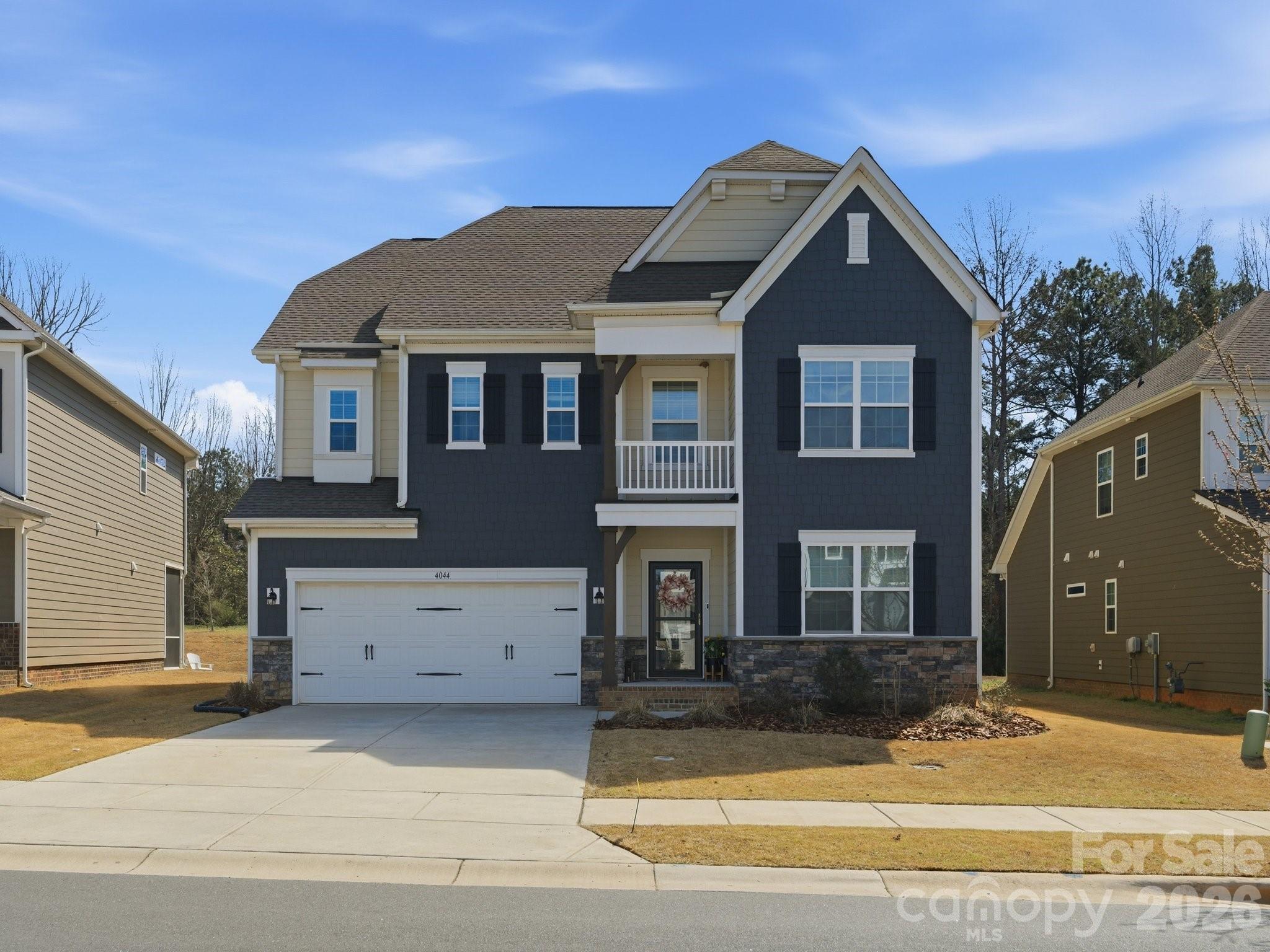 Stunning Hunter floorplan with a rare full guest suite on the main level, a feature that truly sets this home apart from most others in the neighborhood. The main floor features beautiful wide plank blonde LVP flooring and an open great room that flows easily into a light, bright kitchen, creating a welcoming space for both everyday living and entertaining.

Upstairs you will find an oversized loft that makes the perfect second living area, playroom or media space. The spacious primary suite offers a large bedroom and well sized bathroom, while three additional generously sized bedrooms and two full bathrooms provide plenty of room for family or guests.

Step outside to enjoy the screened porch overlooking the oversized, private fenced backyard, a great spot for relaxing or hosting friends. A nice bonus is that this home does not back to the train tracks.

Located in the award winning Millbridge community, residents enjoy resort style amenities including multiple pools, a lazy river, pickleball courts, miles of walking trails and an incredible community atmosphere.