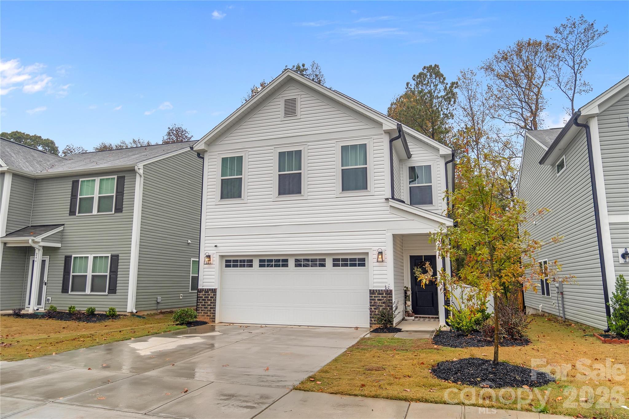 Experience modern luxury in this nearly new, just over a year old home that combines style, functionality, and thoughtful updates. The open floor plan creates a welcoming and spacious environment, perfect for entertaining guests. 
The chef’s kitchen features quartz countertops, a stunning farmhouse sink, and 42-inch cabinets providing ample storage. The large kitchen island and breakfast bar make meal prep and casual dining convenient and social. S.S. appliance being installed at closing brand, offering both quality and aesthetic appeal. Complementing this, all light fixtures throughout the home have been replaced with designer lighting, adding a sophisticated touch.
The first floor is finished with durable, elegant LVP flooring that runs seamlessly throughout, enhancing the home's contemporary look. Escape to the large primary bathroom, featuring a luxurious oversized shower and modern fixtures, providing a perfect retreat. The secondary bedrooms and flexible loft space offer additional comfort and versatility.
Step outside to enjoy a fenced backyard with a spacious back deck—ideal for outdoor gatherings—while enjoying privacy with no rear neighbors and scenic views of surrounding trees. The large laundry room adds convenience, and custom curtains throughout the home create a warm, finished feel.
This home combines premium upgrades with a desirable location, offering a perfect blend of comfort, style, and practicality for modern living.