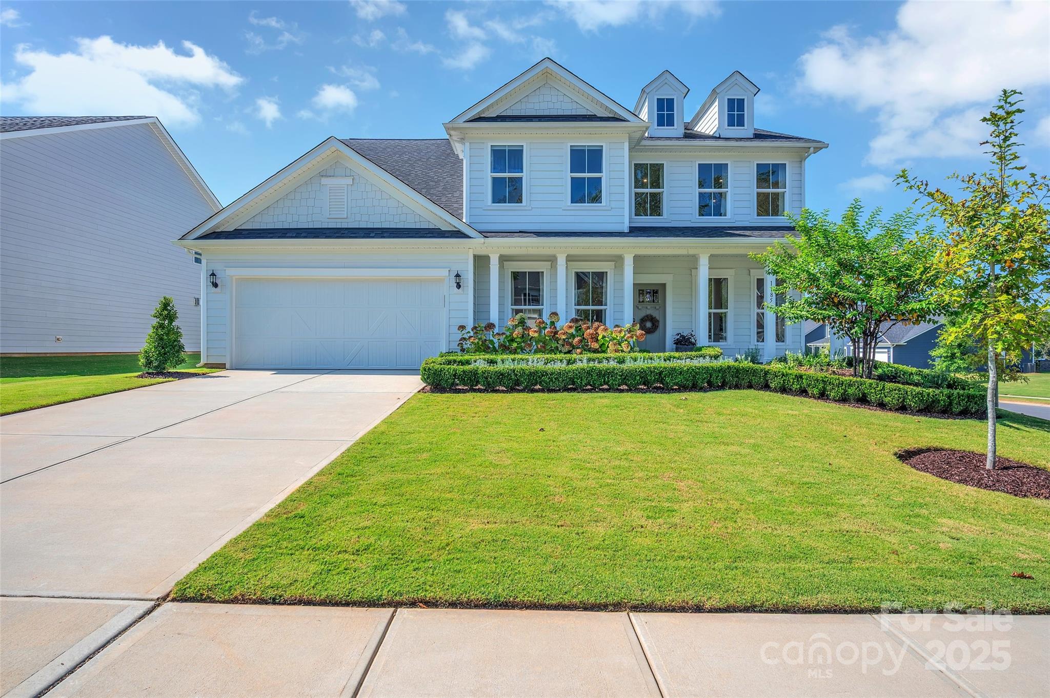 Welcome to this beautifully maintained 5-bedroom, 3.5-bath home on a desirable corner homesite in the private, gated community of Bretagne, built in 2022. Ideally located just minutes from Ballantyne's premier shopping, dining, and entertainment, this home offers spacious and thoughtfully designed living space.

Presenting in exceptional, like-new condition, this home is truly move-in ready. its pristine interiors and well-preserved finishes offer the comfort and quality of new construction, without the wait. Beautiful hardwood floors extend throughout the entire home, adding warmth, elegance, continuity to every room.

The open-concept main level features a spacious great room with a gas log fireplace, creating a warm and welcoming atmosphere. It flows seamlessly into a modern kitchen with stainless steel appliances, a large center island, and ample cabinetry—perfect for everyday living and entertaining. A bright sunroom leads to an extended paver patio, creating an inviting outdoor space ideal for relaxing or hosting guests.

The main floor also includes a guest suite with a full bath, perfect for visitors, a home office, or a playroom/ library/study. Upstairs, you'll find four additional bedrooms and two full baths, an open loft area ideal for a media room, home office, or play space, and a luxurious owner's suite featuring a spa-inspired bathroom with a large walk-in shower with a rainfall shower head, a soaking tub, and dual walk-in closets. A convenient upstairs laundry room adds to the home’s functionality. 

Enjoy community amenities including a pool, playground, and walking trails—all within a quiet, well-kept neighborhood. This home also features a two-car garage and a beautifully landscaped yard.

Don’t miss the opportunity to make this exceptional property your next home—schedule your private showing today.