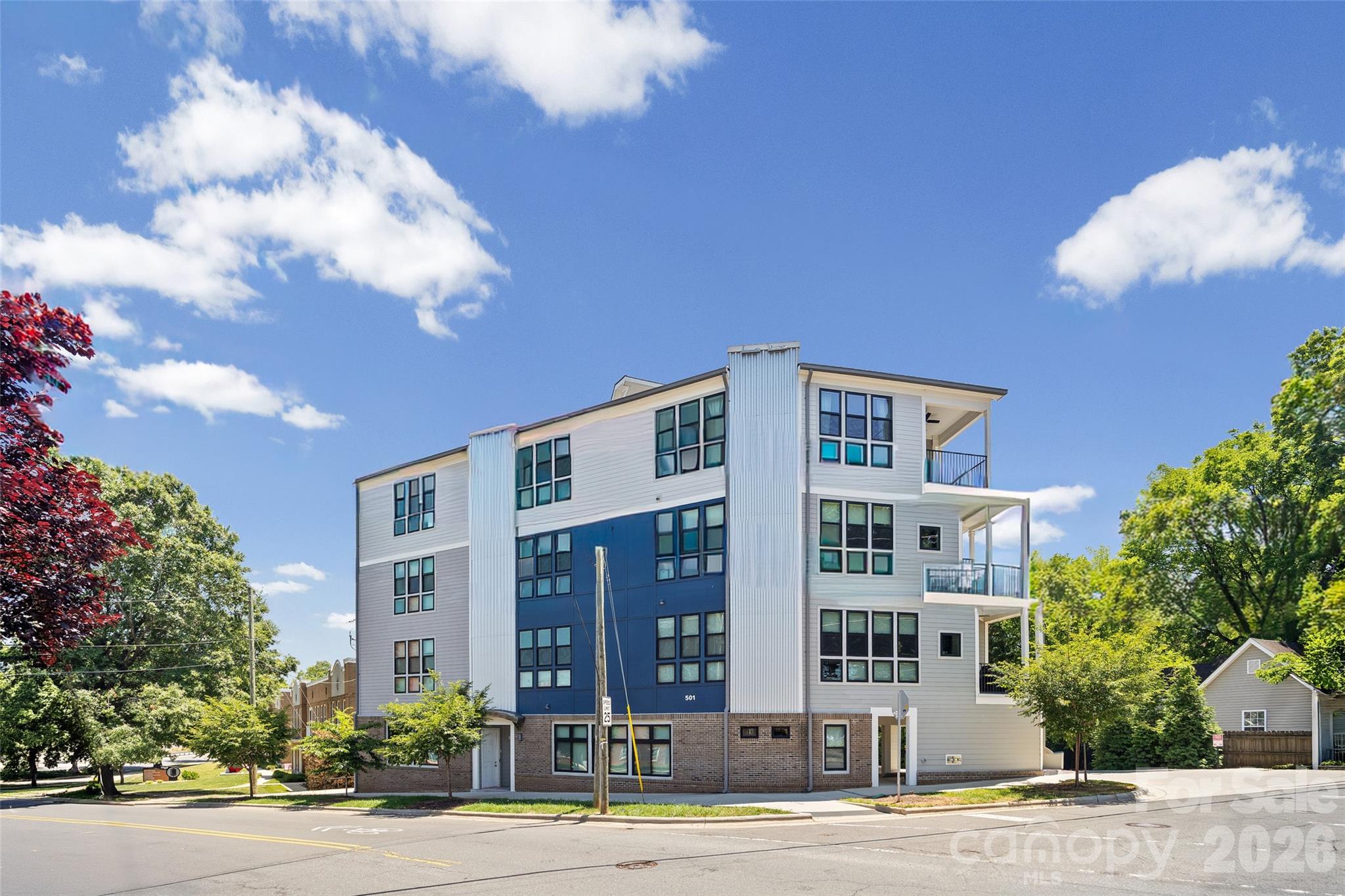 Imagine Penthouse Living in the Heartbeat of Charlotte’s Vibrant Arts District! Discover Modern Luxury and Livability in this Unique Top-Floor Residence with Private Elevator Access and Open Concept Design. It's a Showcase of Urban Architecture, Featuring 10ft Ceilings, Elevated Finishes, Quartz Countertops and Sleek Kitchen Appliances. A Serene Covered Terrace Blends with the Expansive Wall of Windows to Paint a Canvas of Natural Light. Creativity Flows Through the Residence, Leading to a One-Of-A-Kind Primary Suite with a Cozy Reading Niche, Panoramic Views and a Refined En-Suite Bath with Walk-In Closet. Additional Features Include a Versatile Study/Bonus Area, a Secondary Bedroom with Full Bath and In-Unit Laundry. Immersed in Noda's Historic Character and Thriving Arts Scene, this Prime Location is Just Steps Away from Eclectic Shops, Colorful Murals, Live Music Venues and Unique Eateries - Offers Easy Access to the Light Rail, Uptown Charlotte and the Queen City's Top Cultural Destinations. This Condo Exudes Style and Masterful Utilization of Space. Remarkable Pride of Ownership Shines in Every Detail - It Truly Shows Like a Contemporary Art Gallery in the Sky!