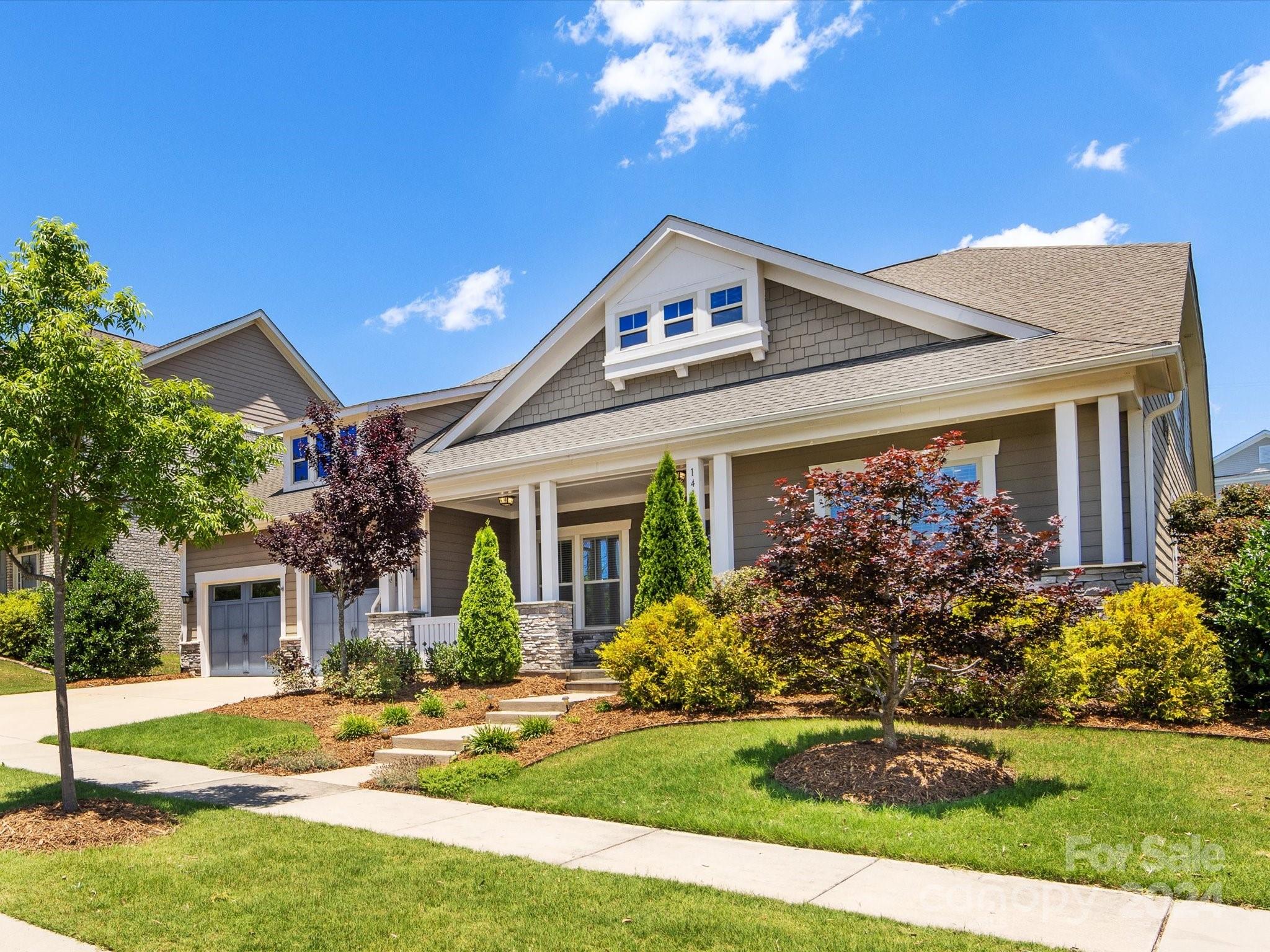 Rare find in Masons Bend- stunning 1.5 story home built by Fielding! This 4 bedroom, 3.5 bath gem lives mostly on the main floor with the primary suite, 2 add'l beds sharing a bath & a dedicated office. Spacious, functional & open-concept floorplan. Kitchen wows with white cabinetry, quartz counters, large island and designer backsplash tile. Butler's pantry features butcher block counters, 2 beverage refrigerators & open shelving. Primary suite is bright and spacious with 2 closets. Luxurious finishes and oversized shower in primary bathroom. Upstairs provides a versatile loft, bedroom and bathroom. Relax to the screened porch with gas fireplace or head outside to the patio and fenced yard. Pocket park across the street! Community amenities: outdoor pools, clubhouse with gym, playgrounds, walking trails, and Catawba river access.