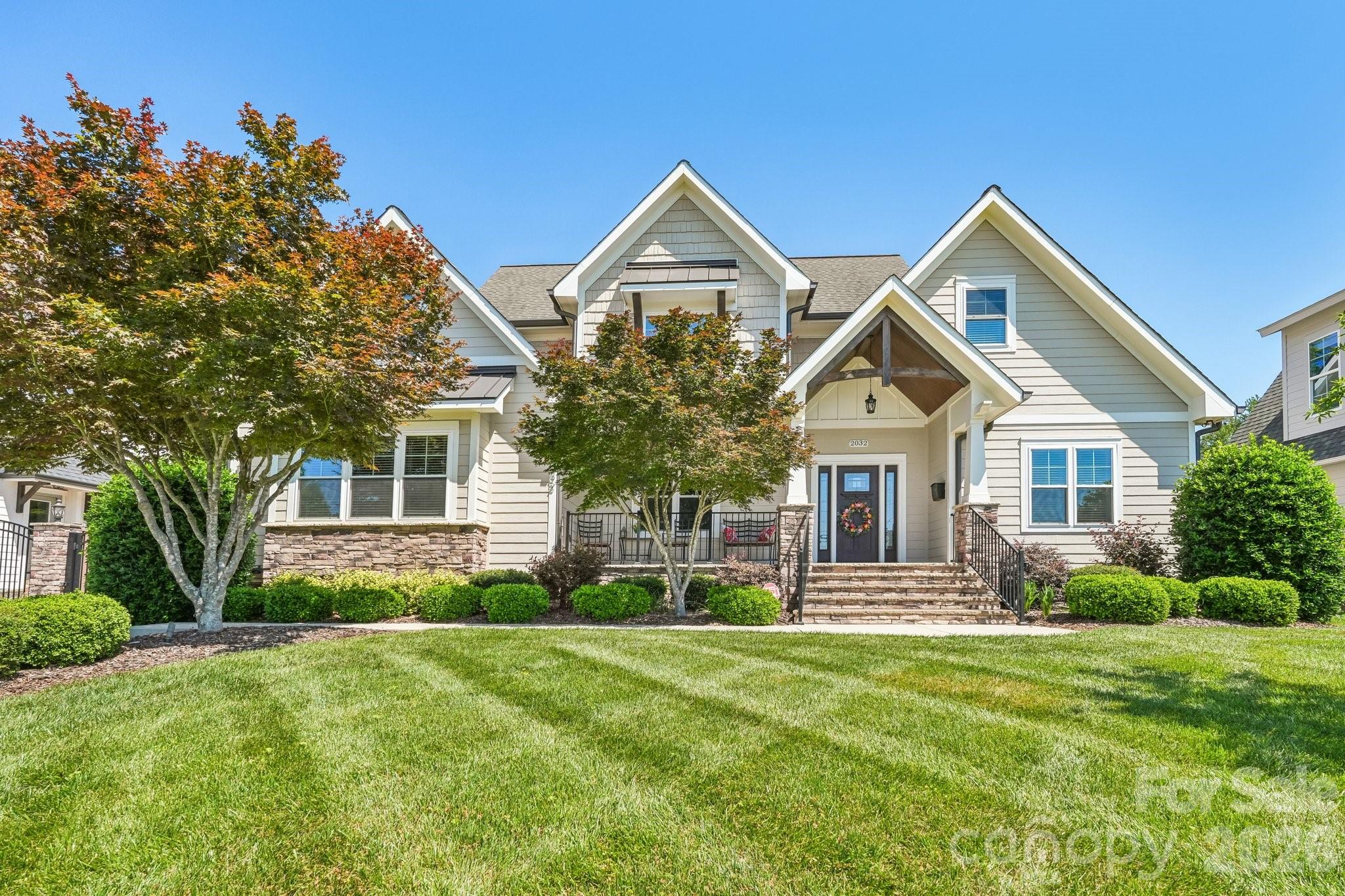 Welcome to this stunning custom-built transitional craftsman located in one of Charlotte’s fastest-growing and most desirable in-town areas near Oakhurst, Plaza Midwood, and Uptown. Situated in the heart of Charlotte’s revitalized east side, this beautifully designed home offers the perfect blend of timeless architecture, luxury finishes, and modern functionality.

Step inside to a dramatic two-story foyer accented by gorgeous hardwood floors and abundant natural light pouring through oversized rear windows. Designed with both entertaining and everyday living in mind, the open-concept floor plan features a spacious great room with coffered ceilings, custom trim detail, and a striking stacked-stone gas fireplace with raised hearth.

The gourmet kitchen is a true centerpiece, showcasing custom cabinetry, granite countertops, stainless steel appliances, designer finishes, and generous prep and gathering space. The main-level primary suite offers a private retreat with spa-inspired comfort and thoughtfully designed storage.

Luxury details can be found throughout the home including custom closets, elevated millwork, oversized windows, and elegant architectural touches. Outdoor living shines with a spacious covered rear porch featuring a custom birch beaded ceiling, skylights, and views of the private, level backyard—perfect for entertaining or relaxing year-round.

Located minutes from Oakhurst, Plaza Midwood, NoDa, Cotswold, and Uptown Charlotte, this home places you near popular restaurants, breweries, coffee shops, parks, and local shopping while offering the charm and character buyers are searching for in Charlotte’s thriving in-town neighborhoods.

A rare opportunity to own a distinctive luxury home in one of Charlotte’s most exciting and rapidly appreciating areas.