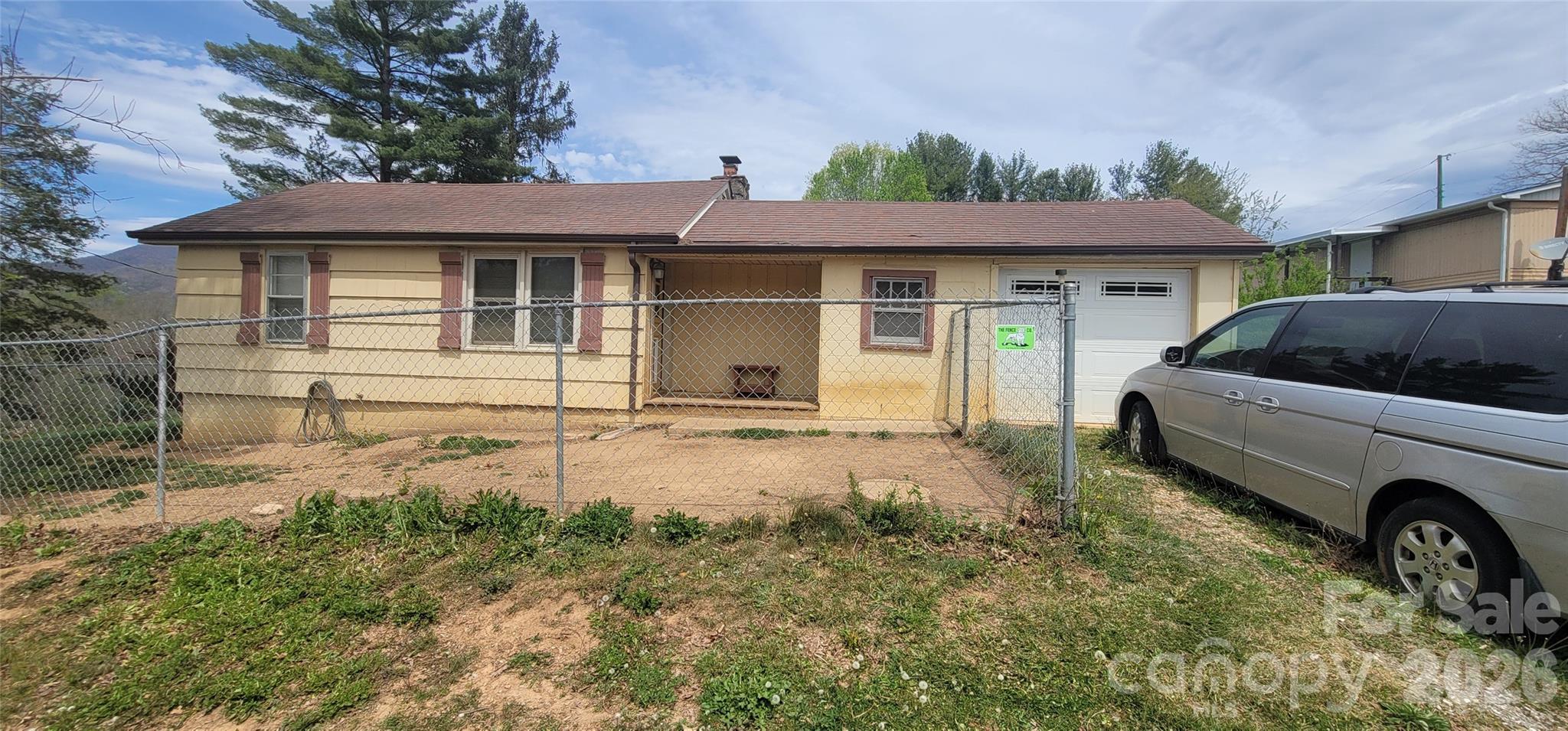 This ranch home offers a solid layout and plenty of potential for buyers looking to add their own style and updates. With a little cleaning and cosmetic improvements, this home can truly shine. The property also features a private backyard, providing a peaceful outdoor space for relaxing or entertaining. A great opportunity for homeowners or investors looking to personalize a home to their taste.