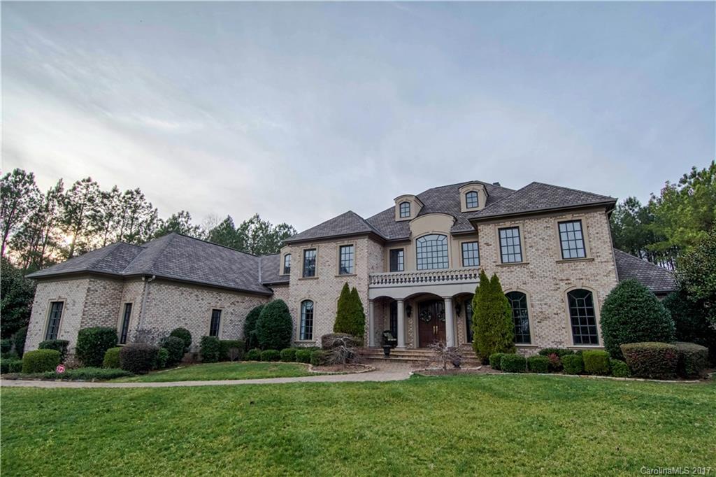 Inside a gated community with luxurious amenities on 1.6+ acres. Home includes 2 finished levels with oversized rooms; Heated pool with cabana; & outdoor exercise with kitchen. On the main level is the kitchen with top of the line appliances; paneled study; dining room; 2-story great room with fireplace & walk out to the pool; & master suite. 2nd level has 4 ensuite bedrooms; home theater; & bonus. The ultimate in luxury and outdoor living.