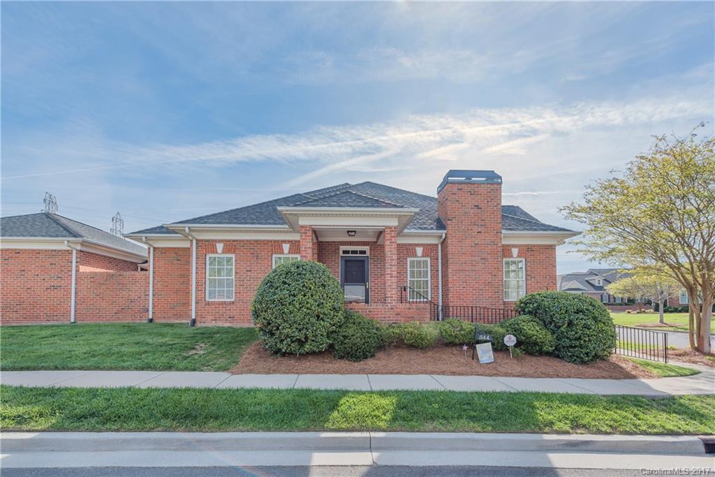 Highly Desirable one-story all brick townhome in Ardwyck subdivision.  Two minutes from I-77 but very quiet and private. Open floor plan, 9' ceilings, hardwood in main living areas and master bedroom, lovely moldings, and tons of closet space. Private brick wall-enclosed patio and oversized 2 car garage with 4' of extra space for a workshop. When these go on the market, they are gone instantly. Do not wait!