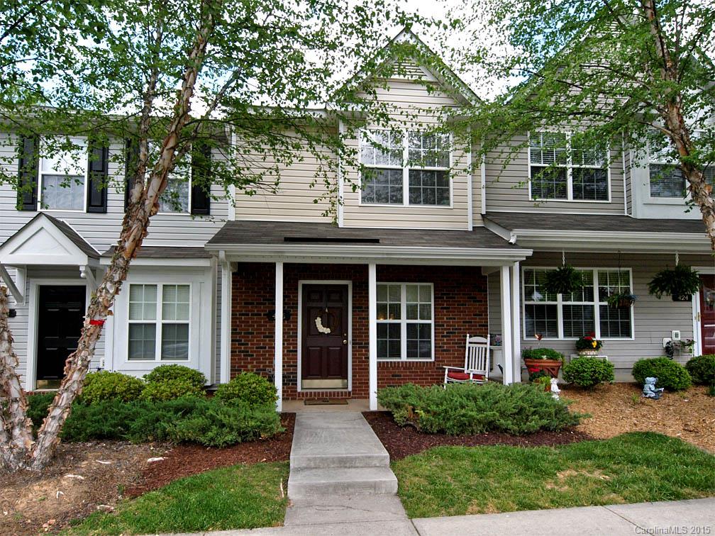 100% Financing Available and Great Location!! Close to Rock Hill and Fort Mill, the new Riverwalk, the Greenway, downtown Fort Mill, Baxter Shopping and I-77 access. Laminate wood,floors, all new carpet, some new interior paint, cul de sac location, vacant and ready for you! Plus an attached storage unit, assigned and guest parking, refrigerator,and water included in the HOA fee, maintenance free living at its' best! Relax by the pool this summer and enjoy a quiet wooded setting!