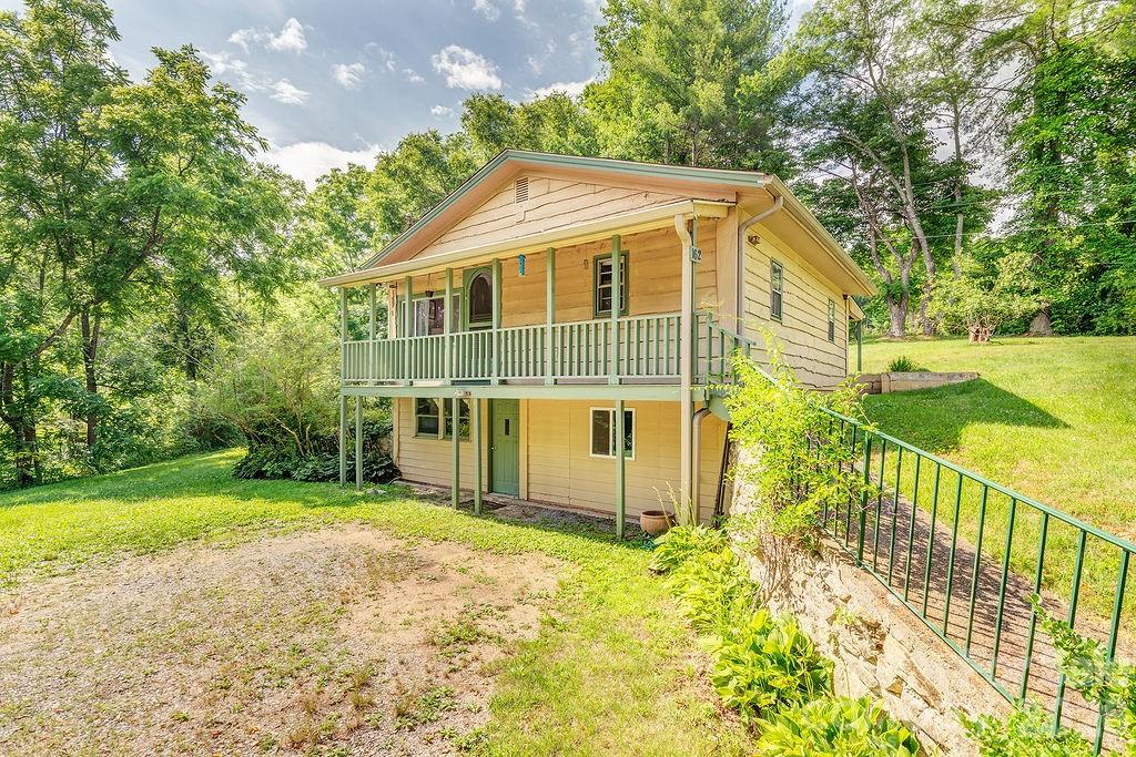 This bright and inviting 2-bedroom, 1-bath home in the peaceful Cane Creek area, offers an open-concept layout and beautiful Acacia hardwood floors throughout. The well-appointed kitchen features new appliances and ample workspace for everyday living and entertaining.

Enjoy year-round comfort with natural gas central heat, an ultra-efficient Bosch mini-split system for cooling, and reliable high-speed internet service. The full unfinished basement, equipped with electricity, provides excellent space for storage, a workshop, hobbies, or future possibilities.

Nestled in a quiet setting with scenic views in every direction, the home peeks at a tranquil pond visible from the living room. A picturesque neighboring red barn enhances the property's charming countryside appeal. The .62 yard is perfect for gardening, pets etc. Also available as a rental. 

Conveniently located just 20 minutes from downtown Asheville, 12 minutes from Asheville Regional Airport, and close to the shopping, dining, and entertainment options along Hendersonville Road, including Whole Foods, restaurants, and a movie theater. Outdoor enthusiasts will appreciate the easy access to numerous hiking and biking trails just minutes away. Also available as a rental.