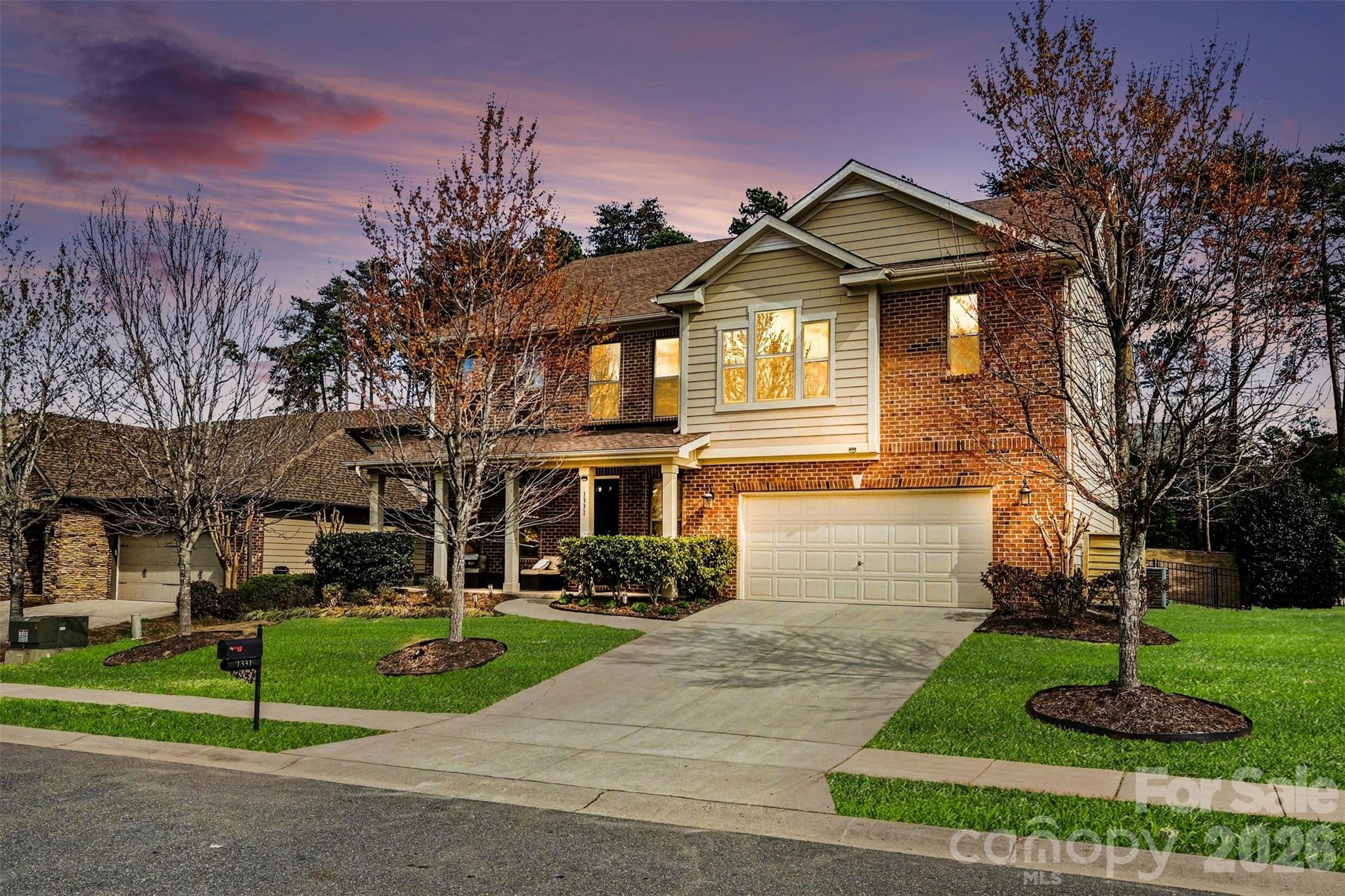 Fresh updates and thoughtful improvements make this beautifully maintained home an exceptional opportunity in the highly sought-after Lake Ridge community of Tega Cay. The homeowners have recently invested nearly $20,000 in brand-new sod in both the front and back yards, creating refreshed landscaping that will green up beautifully as spring arrives.  Sophisticated and move-in ready, this home blends modern elegance with everyday comfort while offering access to Lake Ridge’s resort-style amenities, vibrant community events, and award-winning schools. Ideally located near shopping, dining, I-485, the airport, Catawba Park, and Lake Wylie.  A welcoming covered front porch and impressive two-story foyer open to bright, inviting living spaces highlighted by hardwood floors and 9-foot ceilings. The gourmet kitchen features white cabinetry, granite countertops, stainless steel appliances, and a large center island flowing into the breakfast area and spacious great room with a stunning floor-to-ceiling stacked stone fireplace—perfect for entertaining. A main-level bedroom and full bath provide flexible space for guests, a home office, or multigenerational living. Upstairs you’ll find a large  bonus room with custom barn doors, a Jack-and-Jill bath with dual vanities, a private ensuite bedroom, and generously sized secondary bedrooms—all with walk-in closets. The primary suite is a relaxing retreat featuring a tray ceiling and spa-inspired bath.  The oversized garage offers epoxy flooring, built-ins, and abundant storage.  The extended patio with pergola overlooks a fenced backyard featuring a level entertaining/play area off the patio, a gradual slope leading to another spacious upper play area, and additional property extending beyond the fence line—providing flexibility, privacy, and room to enjoy.

Stylish, functional, and located in one of the area’s most desirable communities—this Lake Ridge home is ready to welcome its new owners.
