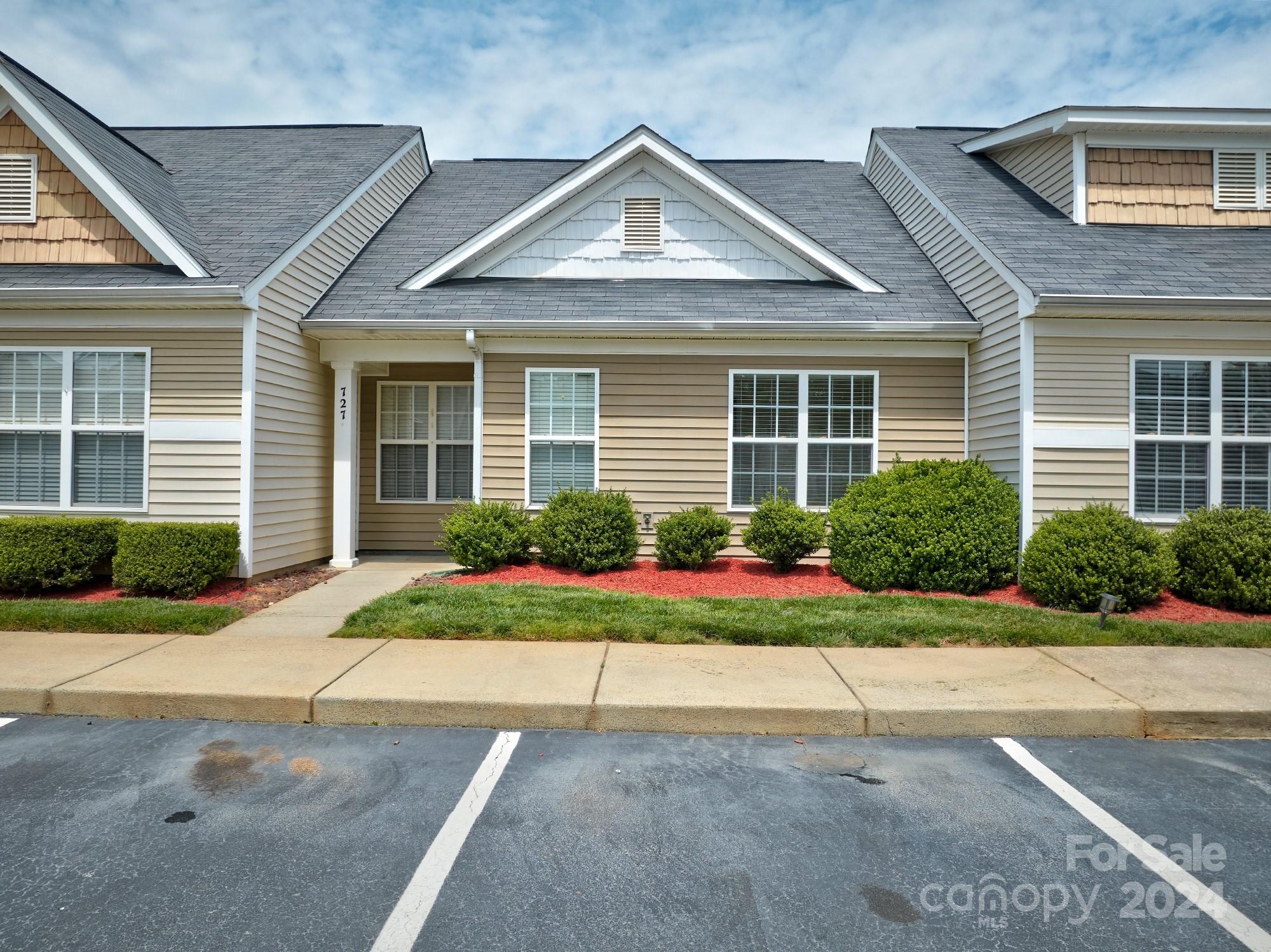SELLER HAS JUST REPLACED ALL THE CARPET AND PAINTED THE ENTIRE HOME.  COME BACK FOR ANOTHER LOOK!Lots of possibilities for this 1!! 1 1/2 story townhome in the heart of Lake Wylie and walkable to restaurants and shopping!  3 bedrooms, 2 full baths and primary suite tucked away by itself upstairs. 2 bedrooms ,bath, laundry , great room, dining area & kitchen downstairs.  Lots of walk in attic storage.  Could be great roommate set up, investment property or family home!  Harpers mIll offers pool, covered picnic area and close to the lake!  Home has great wood deck in the back and very private.  Located in the award winning Clover school district too!  Thanks for showing.