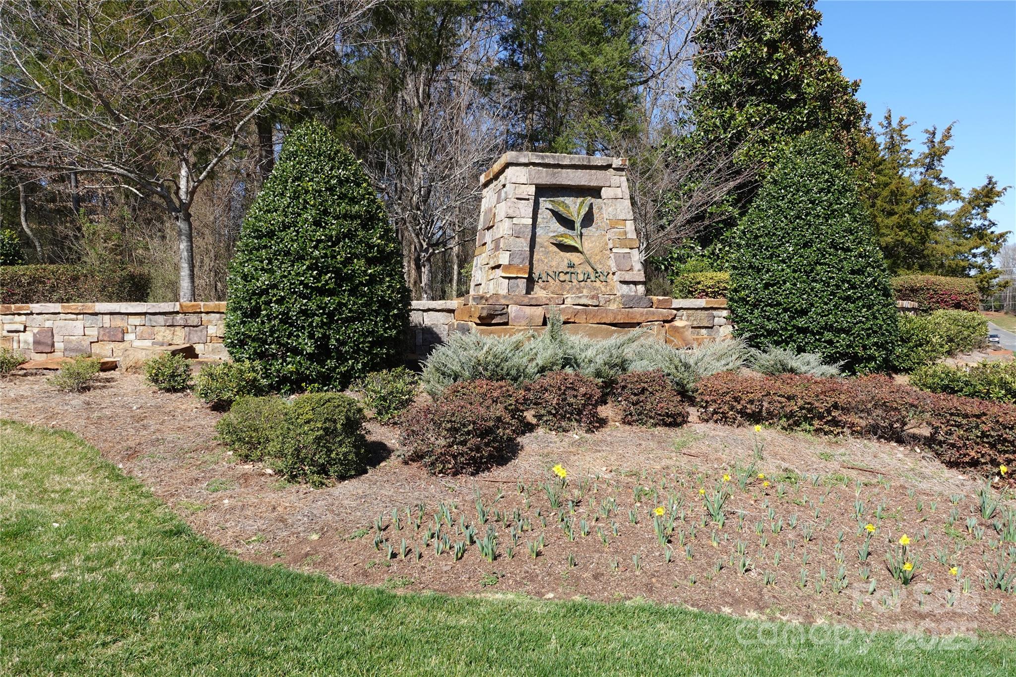 Build your dream home on this sprawling and private lot in The Sanctuary. The Sanctuary really has all you could hope for in a private, tucked away area of Charlotte on Lake Wylie. For starters all residents can enjoy the beauty of Lake Wylie including access to boating, canoeing, and kayaking. Boat slips are also available for lease. The Lodge grants access to the 24/7 fitness center, Kids room, on-site Director's office, and rental space for perfect for private events. There are also more than 22 miles of private nature trails that can be found in The Sanctuary. Access to an Olympic sized swimming pool, splash pad adjacent to a beautiful lake view.