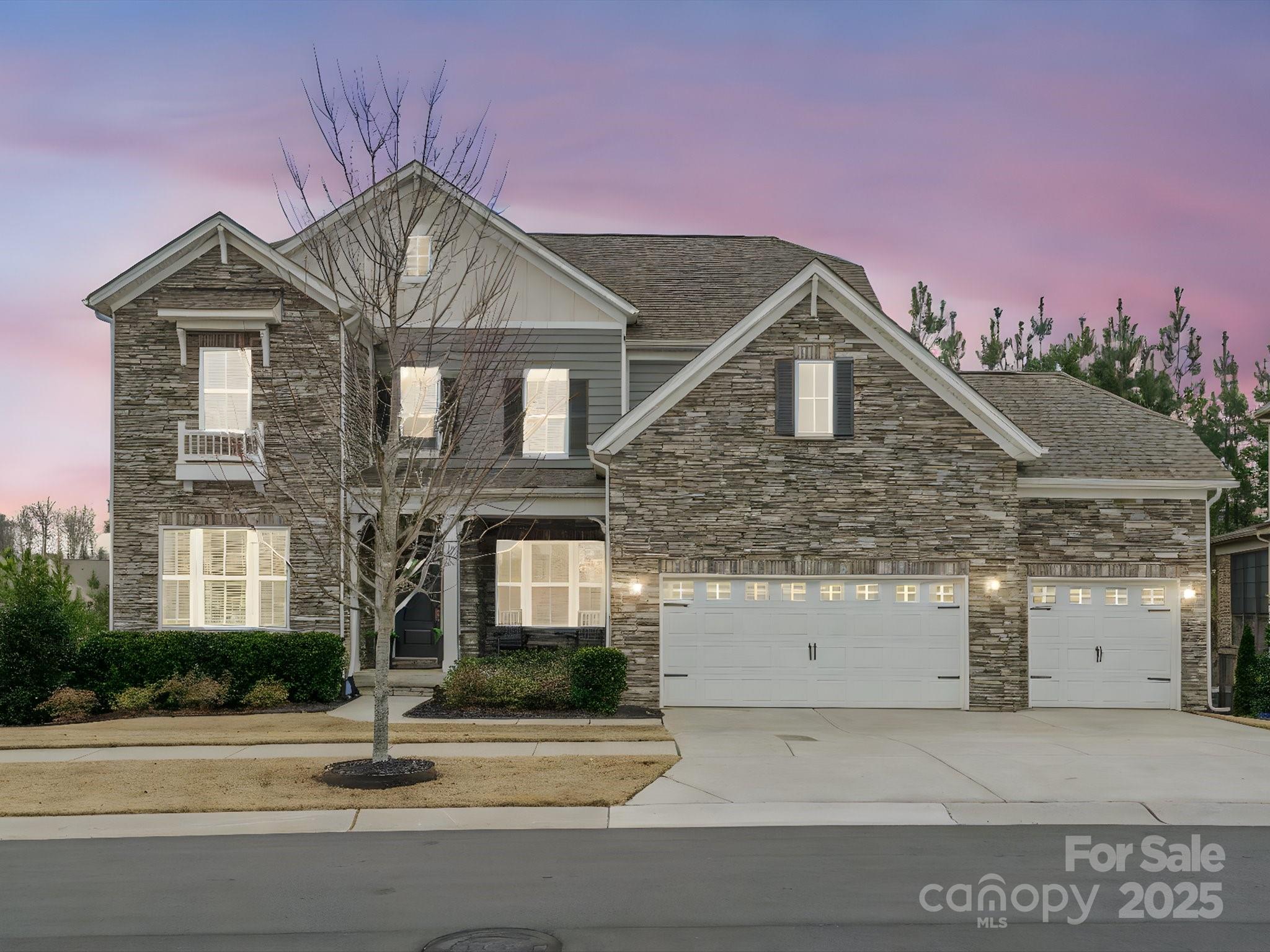 Discover the breathtaking charm of this exquisite two-story basement home, where every detail has been meticulously crafted to captivate your senses! From custom Iron door, to the chef’s dream kitchen. These motivated sellers, have it all ready for you! Here are just a few more fantastic aspects of this home: main level guest guest Br plus another flex room for office on main level. White kitchen w/oversized island, quartz, gas stove & walk-in pantry. Cozy breakfast area with a triple slider, opens to screened porch w/stone gas fireplace. Upstairs includes two BRs sharing a Jack-and-Jill bath, spacious primary suite, huge loft & laundry room. The finished basement is an entertainer's dream featuring a pool table, great room, built-in dining, 5th Br, full bath, & addtn'l kitchen area. Outside, enjoy the covered patio w/wood ceiling & stone wall, huge paver patio, & fenced yard surrounded by tall trees. Warm colored floors, custom trim work, 3 car garage & more!