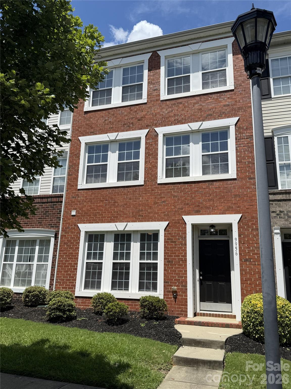 Fantastic 3 story townhome in desired Ayrsley! Freshly painted with new carpet in dining Room, stairs and hallway. This home features a large sitting/living room and half bath on the main level. 2nd floor has another living room with dining area, spacious kitchen with island and breakfast area, half bath and den with fireplace. 2nd story semi-private deck off the back of the home. Top floor has primary bedroom with vaulted ceiling, 2 closets and private full bath with dual vanity, tub and shower. 2 other bedrooms, full bath and laundry also on top floor. Rear entry garage with driveway space. Located off of S. Tryon and Westinghouse with quick access to I-485. Easy commute to the Airport, Uptown Charlotte, Ballantyne or Fort Mill. Don't miss the chance to own a great home in a convenient area!