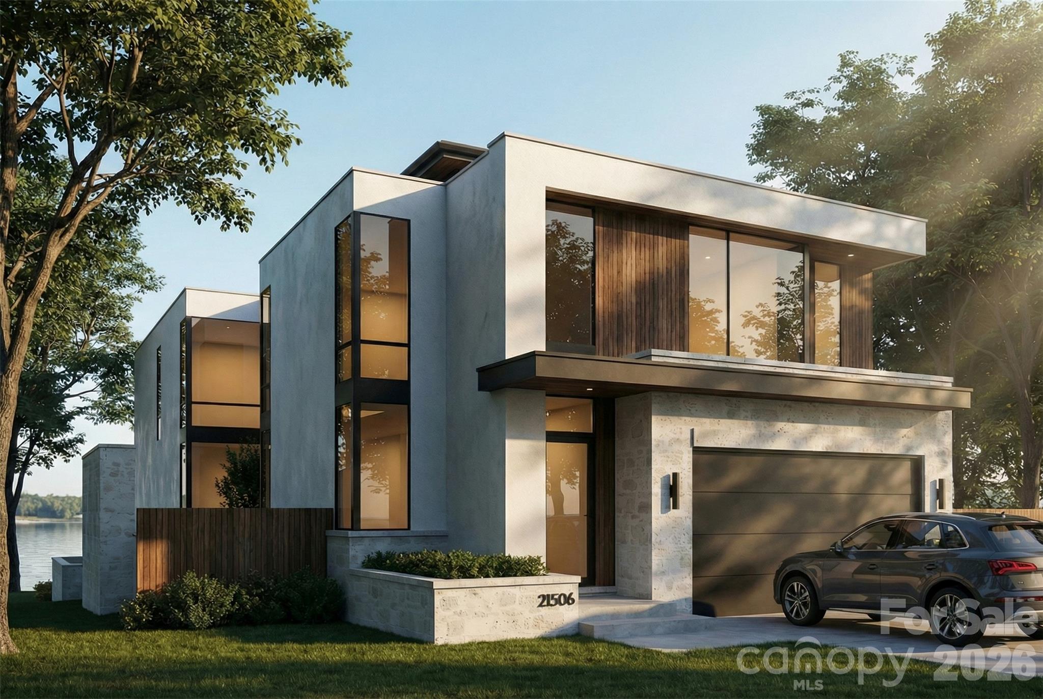 Exceptional proposed new construction waterfront modern residence, envisioned as a striking three story design with approximately 5616 square feet of interior living space plus 528 square foot garage. Upon completion the home is designed to make an immediate statement with clean architectural lines, bold massing wood accents and expansive glass that floods the interiors with natural light and frames the lake. Curated lighting is planned throughout the home to elevate the architecture after dark and create a refined intentional atmosphere. Inside, the main level is planned around dramatic volume and seamless flow, with white oak hardwood floors, floor to ceiling windows and doors and large stacked sliding systems designed to fully open the living spaces to the outdoors while perfectly framing the water. At the center of the home the chef's kitchen is planned as both a statement and a workhorse, featuring custom cabinetry and a full suite of high end Monogram appliances including a 48" range and 48" refrigerator . A substantial 5X12 island anchors the space, while a dedicated scullery supports effortless prep, catering, and entertaining with everything kept streamlined and out of sight. A built in bar area is also planned to elevate hosting and everyday convenience. Large scale sliders are designed to open to the covered porch and terrace, creating a true indoor outdoor experience. The rear concept is designed around resort style waterfront living with an option for a future infinity edge pool and hot tub, generous paver stone terraces, and layered spaces for dining and lounging that are positioned to maximize views. The primary suite is planned on the main level as a private retreat with a spacious dressing room and spa inspired bath. Upstairs five additional bedrooms plus a dedicated office are designed for comfort and flexibility, with multiple ensuite baths and generous storage throughout. The third level adds a distinctive lifestyle feature with a rec room, powder bath and roof terrace, creating an ideal space for sunset view or a private lounge above it all. a rare opportunity to secure a design driven modern build where architecture, scale, and waterfront lifestyle come together in a truly one of a kind offering. Planned features and finishes are subject to change prior  to completion.