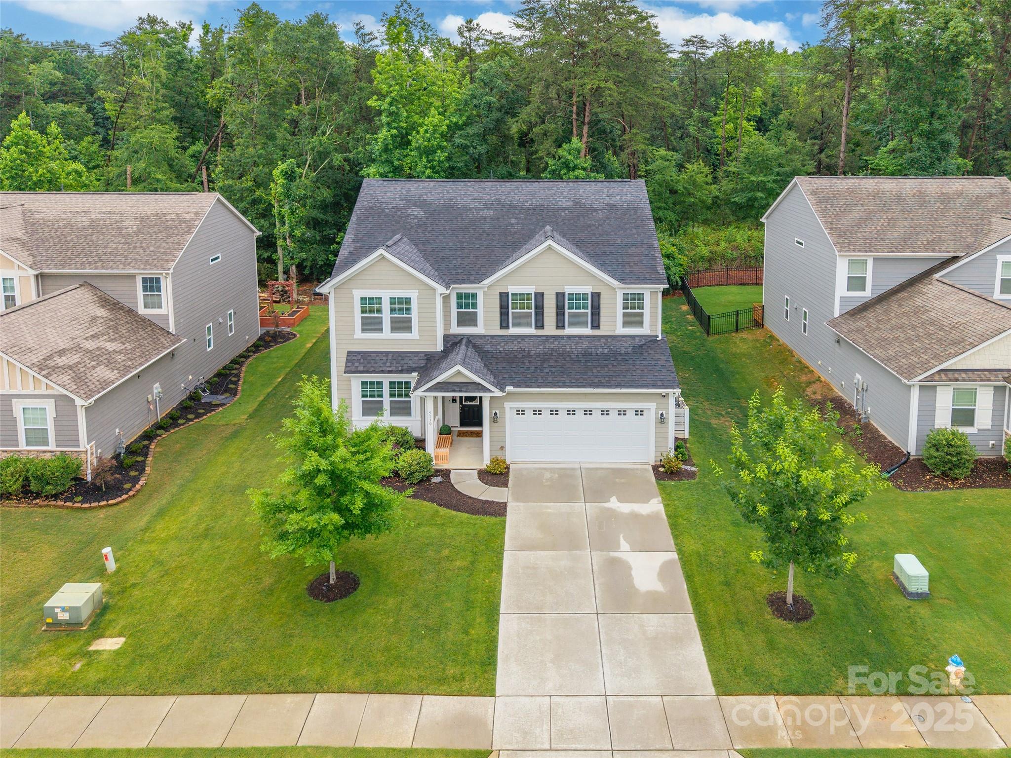 Step into this meticulously maintained 5-bedroom, 3.5-bath home offering generous space and thoughtful features throughout. The main level includes a convenient in-law suite with its own ensuite full bathroom. The open-concept kitchen shines with stainless steel appliances, a phenomenal butler’s pantry, and plenty of cabinet space. Tall 8-foot doors and 9-foot ceilings throughout add an extra touch of style and openness. You’ll find three walk-in closets in the primary suite, neutral colors throughout, and ceiling-mounted Wi-Fi access points on both floors for seamless connectivity. Out back, enjoy the custom built covered patio with a gorgeous stone fireplace, an ideal space to relax or entertain. The community offers added perks with a pool, playground, and more. A wonderful blend of comfort, space, and style is waiting for you here! Home is located near shopping, restaurants, and a 5 minute drive to Lake Wylie Marina for your boat!