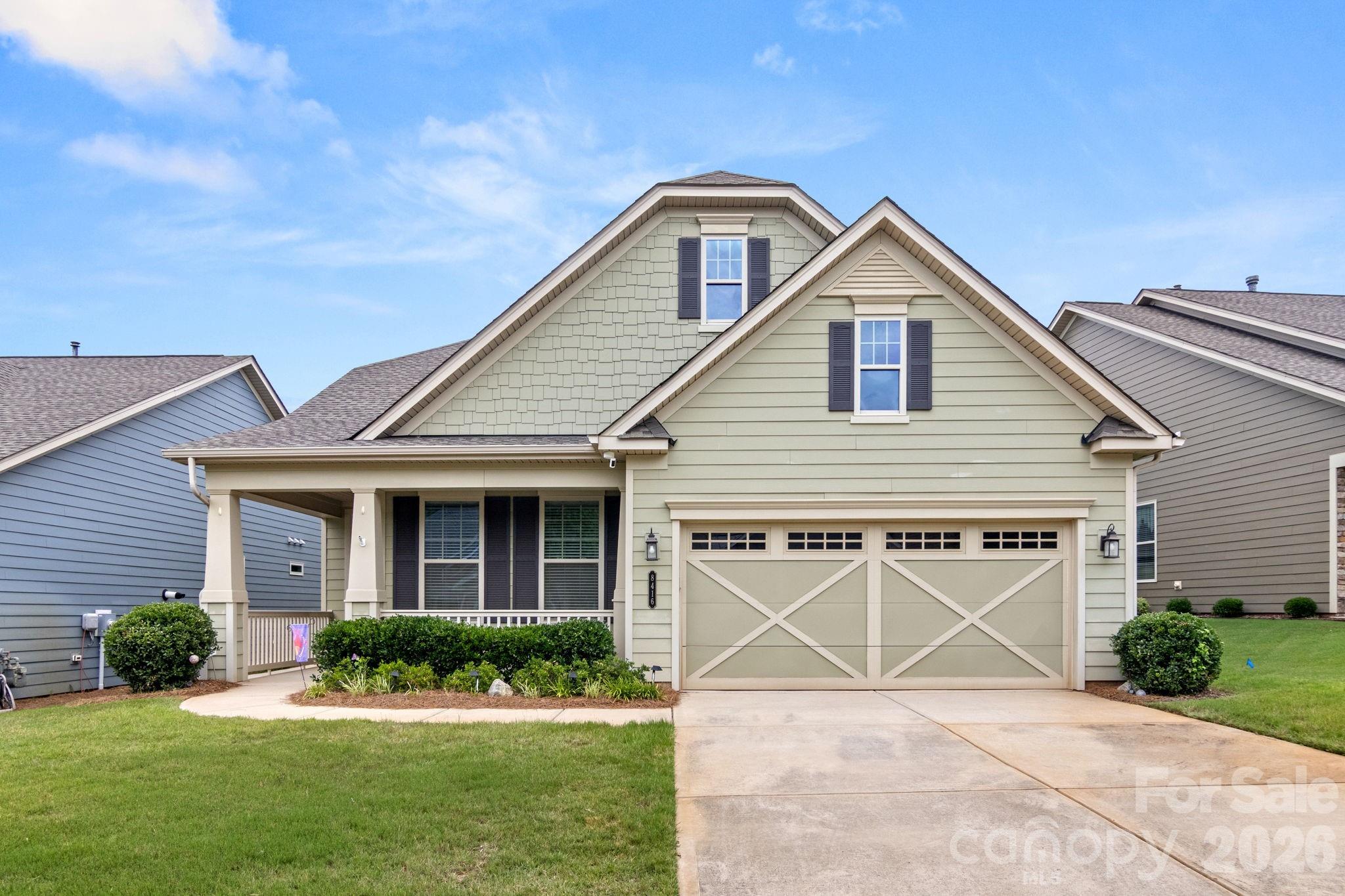 Welcome to 8416 Festival Way in Cresswind, featuring the award-winning Dogwood floor plan! 
This beautiful home features an open design, spacious rooms, and abundant natural light. The kitchen, dining area, and living room flow seamlessly. Tall ceilings and beautiful LVP throughout add to the open and airy feel.
The large kitchen boasts white cabinetry, a center island, granite countertops, under-cabinet lighting, stainless steel appliances, pantry, and tile backsplash. The spacious primary suite has a tiled walk-in shower, dual vanities, and a walk-in closet with custom shelving.
What truly sets this home apart is the private, fenced backyard. It backs to mature evergreen trees and is flanked by privet shrubs on both sides. You can enjoy this peaceful retreat from the covered porch and extended patio.
The HOA provides lawn maintenance, cable TV, internet, and security system. Resort-style amenities include indoor and outdoor pools, tennis and pickleballs courts, fitness center, billiards room, demonstration kitchen, walking trails and fenced dog park. An active social calendar offers something for everyone, including frequent food trucks. Learn more at https://www.cresswindcharlottehoa.com/home/.  Yard sign has been ordered...