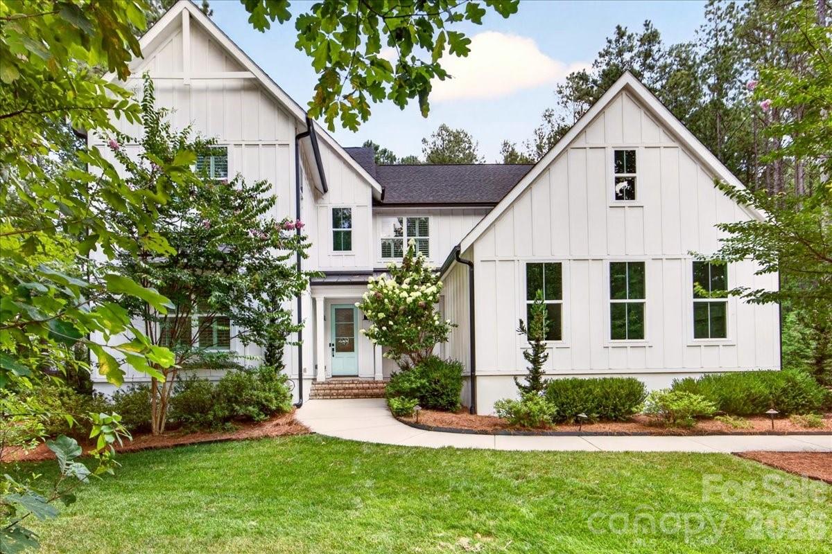Welcome to 3142 Sherman Drive, where timeless design, exceptional craftsmanship, and everyday functionality come together in a home thoughtfully created for every stage of life.

At the heart of the home, the chef's kitchen is as beautiful as it is practical, featuring an abundance of custom cabinetry, premium KitchenAid appliances, under-cabinet lighting, an oversized center island, and a spacious walk-in pantry with custom wood shelving—offering storage and workspace that will never disappoint.

The inviting family room impresses with soaring vaulted ceilings, a sleek linear gas fireplace, custom built-in shelving, and expansive bi-parting sliding doors that effortlessly blend indoor and outdoor living.

The main-level owner's suite is a private retreat, complete with a spa-inspired bath, an extraordinary custom-designed walk-in closet, and the convenience of a private laundry room exclusively for the owner's suite.

Working from home is effortless with the dedicated main-level office featuring elegant French doors. Just off the foyer, an oversized flex room offers endless possibilities. Previously used as a homeschool classroom, this versatile space could easily serve as a game room, mahjong room, second executive office, library, sitting room, or playroom.

Upstairs, you'll find a spacious rec/flex room with storage, along with four generously sized bedrooms. Two bedrooms feature private en-suite baths, while the remaining two share a well-appointed shared bathroom, providing the ideal balance of privacy and comfort for family and guests.

Outdoor living is equally impressive. The covered patio, finished with travertine pavers and motorized screens, creates a true extension of the home—perfect for entertaining or relaxing in every season. The fenced backyard provides plenty of room for pets, play, and gatherings, while the property extends well beyond the fenced area, offering additional wooded acreage that can remain as a private natural backdrop or be cleared to create an even more expansive outdoor retreat.

Every detail of this exceptional residence has been carefully considered, blending luxury, comfort, and versatility into a home designed to be enjoyed for years to come. Welcome to 3142 Sherman Drive—where thoughtful design truly feels like home.   See detailed list of personal property remaining with the home~
Riverchase Estates offers resort-style amenities, a fitness center, an clubhouse event space with direct access to an outdoor terrace featuring a cozy fireplace and TV. The community has a freeform swimming pool, tennis courts, ponds with illuminated fountains, scenic walking trails, and picnic space.  For outdoor enthusiast  access to the Catawba River provides endless opportunities for kayaking, fishing, wildlife observation, and peaceful days surrounded by nature. This is more than a neighborhood—it's a lifestyle you'll love coming home to.
