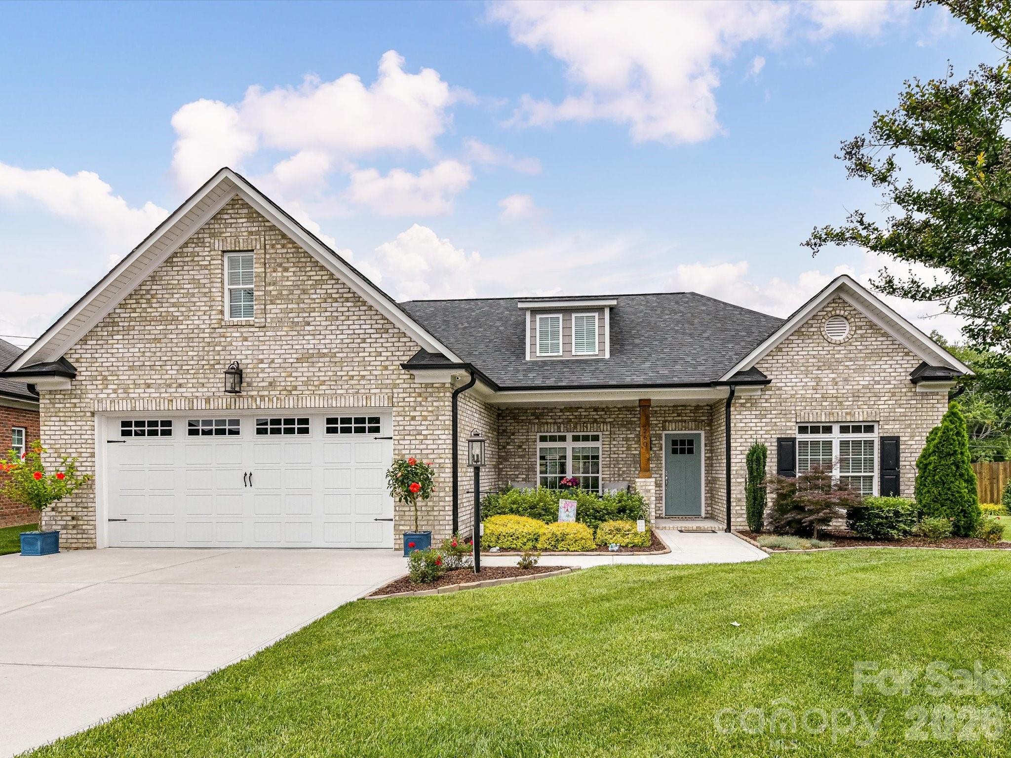 Stunning custom-built full brick ranch offering timeless quality and thoughtful design throughout! This beautifully maintained one-owner home features 3 bedrooms, 2 baths, and a desirable split-bedroom layout with an open floorplan perfect for both everyday living and entertaining. Extensive millwork adds charm and character, while the spacious living areas flow seamlessly with all vinyl plank throughout except tile flooring in the baths.
The kitchen has Quartz countertops, tile backsplash, large island and SS appliances-Refrigerator remains.
The huge primary suite is a true retreat, complete with a tray ceiling, dual sink vanity w/Quartz top, walk-in shower, private water closet, and a massive walk-in closet. 
Enjoy outdoor living from the covered front and back porches overlooking beautifully landscaped grounds. The backyard offers added privacy with a fence and a backdrop of Green Giant trees. Situated on a cul-de-sac lot, this home also includes an oversized 2-car garage with drop-down attic -- huge storage area already layered with plywood.
Located in a desirable neighborhood with sidewalks and street lighting—yet NO HOA—this home combines comfort, convenience, and location. With 1,789 heated square feet and only 4 years old, it’s truly move-in ready! Termite Bond for property.  Home is owned by NC Realtor.