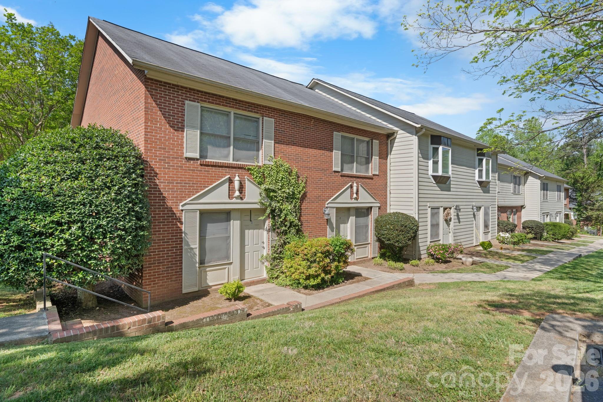 Location, location, location! Welcome to this inviting and well-kept condo in the desirable Hawksridge community. This unit features a laundry area on the main level, a cozy wood-burning fireplace, and a functional layout designed for easy everyday living. Nestled within a shaded, tree-lined setting, the property offers a sense of privacy and charm while remaining close to it all. Enjoy convenient access to shopping, dining, schools, and major commuter routes, making this an excellent option for both homeowners and investors seeking a low-maintenance, move-in-ready opportunity in a prime NE Hickory location.
