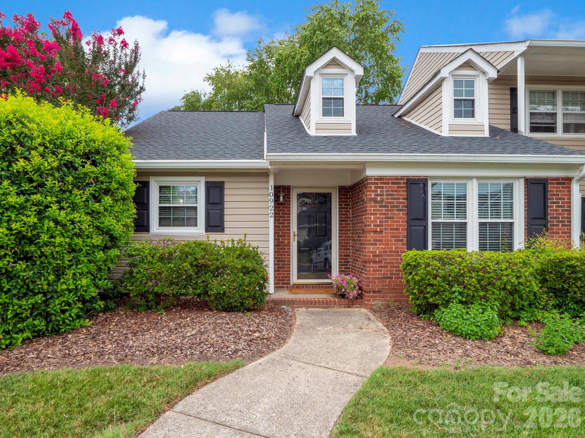 WELCOME HOME - Located in the Beautiful South Charlotte Country Club Neighborhood of Raintree, you will find this Lovely Townhome overlooking the Golf Course. This one level end unit with lots of light has a spacious great room / dining room combination with two bedrooms and two full baths all on one level. It has been freshly painted in a neutral color with new LVT flooring thru out. The kitchen is recently updated with solid surface counter tops and a ceramic backsplash. There are two assigned parking spaces right at your front door. This one level Townhome overlooks the seventh fairway of the south course for your viewing from your wood deck. Enjoy The Raintree Lifestyle with Amenities: Opportunity to join the Raintree Country Club for golf, swimming and tennis. HOA dues include trash, water, sewer and yard maintenance. Prime South Charlotte location close to premier shopping, parks and schools. Fireplace convey AS/IS.  Schedule your showing today.