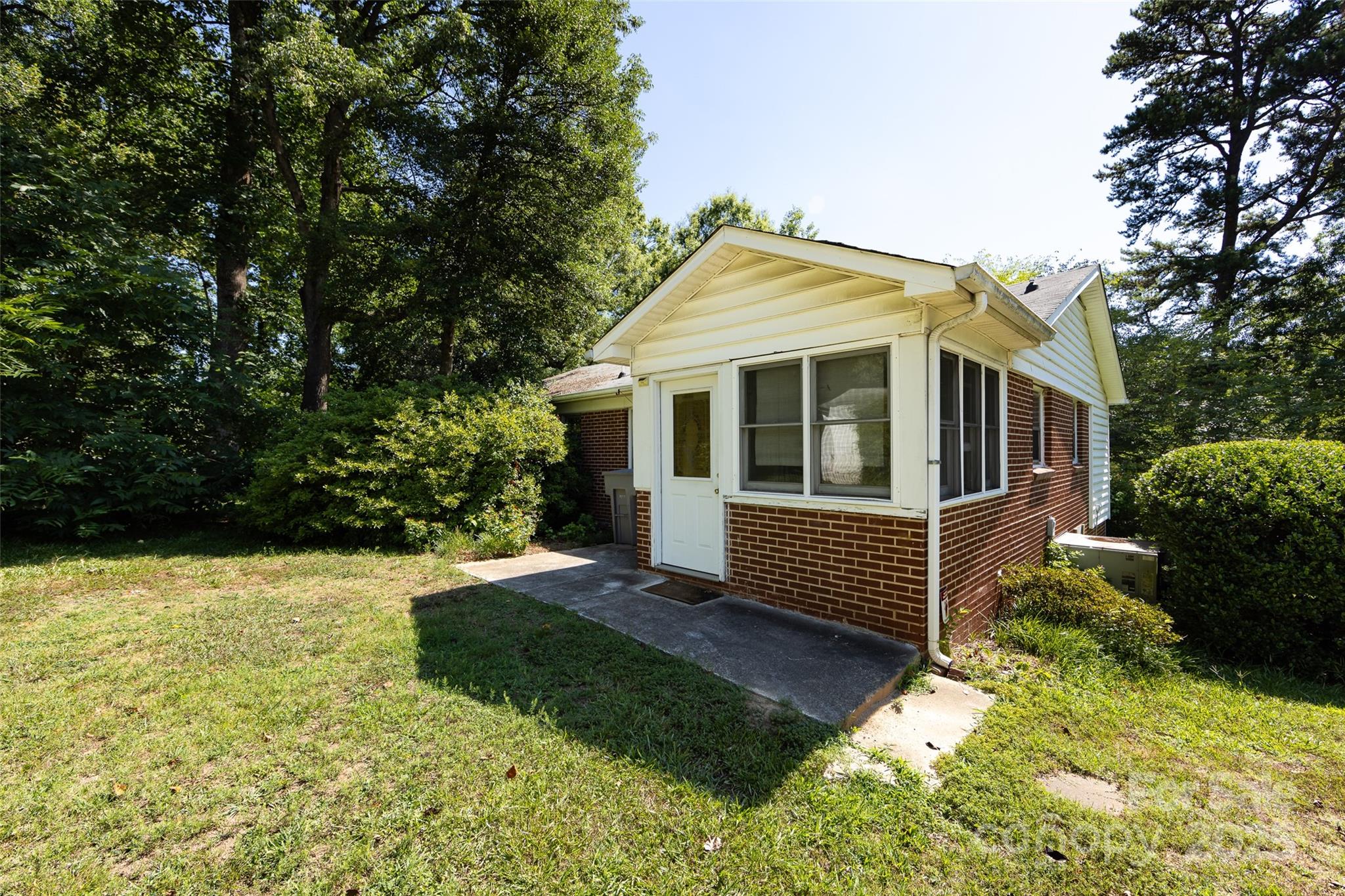 Charming single-story home in very convenient part of town. Easy access to both I-85 and I-77. Minutes from Uptown, shopping and dining. Three good size bedrooms and a full bath accompany a spacious kitchen and family room. There is also a front and back porch. This home offers your buyer the opportunity to make it their own. Great for a builder to clear or renovate. Endless possibilities for this home which has stood since 1954.