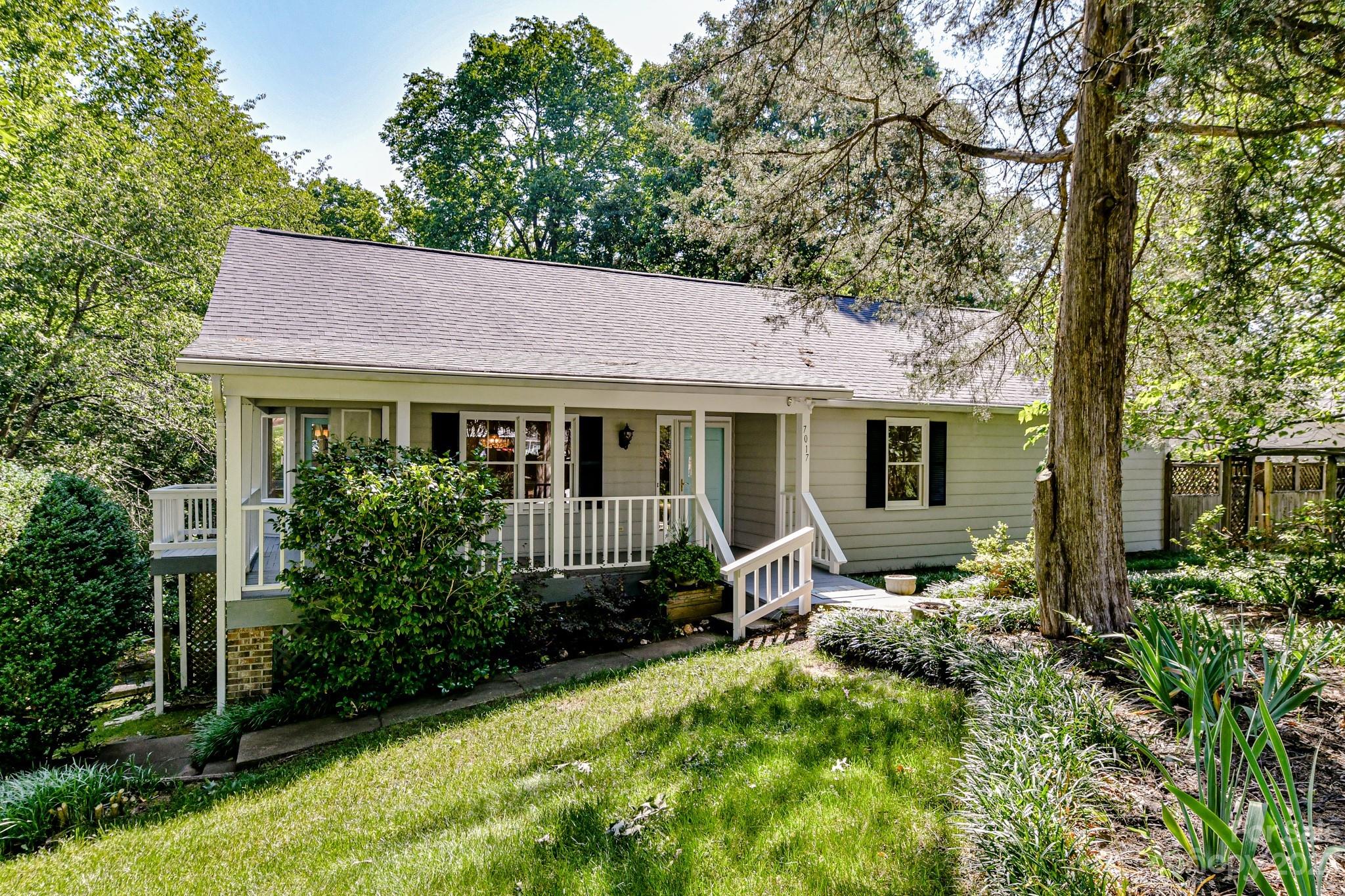 This Gorgeous Stonehaven ranch with basement is updated with primary bedroom on main level AND has a .6 Acre backyard. Wrap around covered front porch leads to front door, side kitchen entry and also has extra closet storage. Cooks Kitchen is updated with dinette and a bay window overlooking side yard. Dining Room overlooks front porch. The spacious primary boasts entry to back deck and en suite updated bath with double vanity. Fireplace in Living Room AND in Basement family room. Well lit Living room has entry to deck. Basement Family room has built ins on each side of fireplace.  In 2017 Kitchen was updated, New Roof and Wood Floors redone.  This .6 acre picture-esque backyard is perfect for entertaining, relaxing, or a serene stroll. It’s spacious with accents that add the perfect touch. This landscape will transport you to a woodsy oasis.  Stonehaven is well located close to South Park, Cotswold, Matthews and MORA areas.