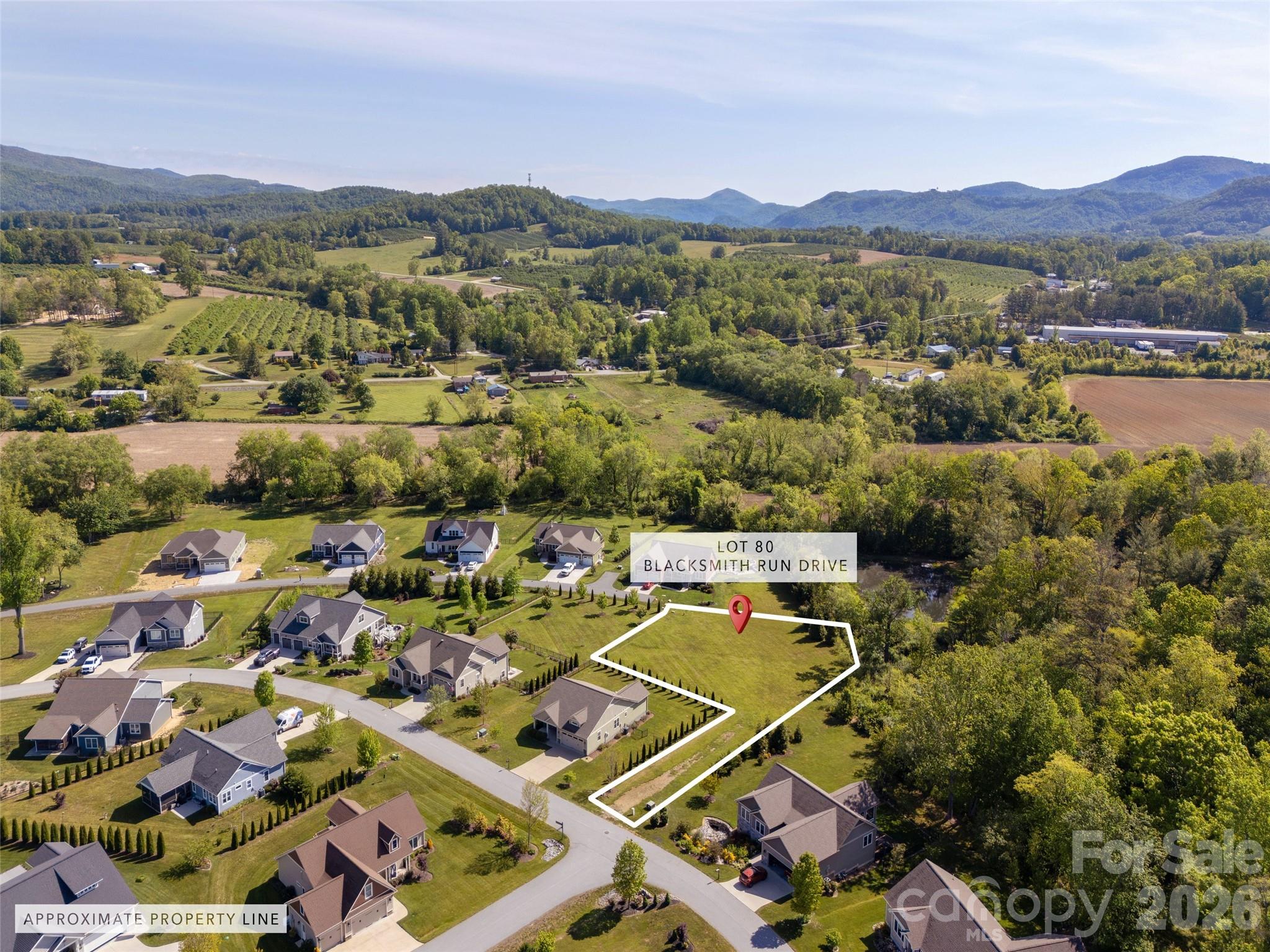 Build your dream home on this gorgeous, level .66 acre lot in a gated community with beautiful mountain views. Enjoy the convenience of community sewer and a host of amenities including a clubhouse, fitness center, and outdoor pool. The community offers security, well-lit streets, and beautiful landscaping. The clubhouse is a vibrant hub for gatherings, while the fitness center and pool provide healthy and relaxing options. With ample space for custom design and outdoor living, this lot is an ideal retreat for those seeking both comfort and natural beauty. Envision mornings overlooking the peaks and afternoons at the pool—make your dream a reality in this welcoming, modern neighborhood!