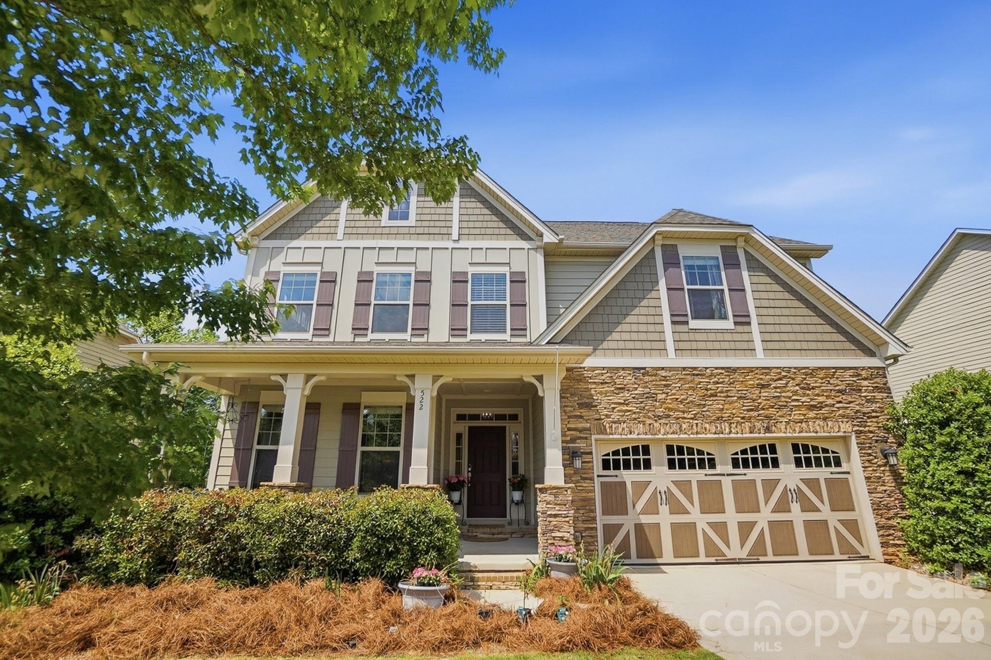 Welcome to your stunning 5-BR (plus a bonus room that can be a 6th!), 4-BA Craftsman masterpiece in the highly coveted Cedarvale Farms! Offering 4,156 sq. ft. of luxury living, this home blends high-end architectural detail with incredible versatility—all while enjoying Low Cabarrus County taxes and top-rated Hickory Ridge schools.

The main level greets you with an airy open floor plan, heavy crown molding, and a convenient guest suite with a full bath. The chef’s kitchen is a true showstopper, featuring granite countertops, tile backsplash, gas double ovens, and a massive center island perfect for entertaining.

Recent updates make this home feel like new: Freshly painted interior rooms, brand-new carpeting in secondary bedrooms, and those signature site-finished hardwoods flowing throughout the living room, both sets of stairs, upstairs hallway, bonus room, and the entire primary suite (including the closet!).

The 2nd-floor primary retreat is a sanctuary of its own, boasting a tray ceiling and a spa-like bath with a garden tub and dual granite vanities.

The Standout Feature: A fully finished 1005 sq. ft. walk-out basement apartment! Ideal for an in-law suite or young adults, it features a full kitchen (all appliances convey), living/dining areas, a full bath, a bedroom, and ample unfinished storage.

Outdoor Living at its Finest: Relax on the rocking chair front porch or head to the back deck, where stairs lead down to a beautiful flagstone hardscape. The nice-sized, fenced backyard backs to mature trees, providing exceptional privacy.

Community & Location: Cedarvale Farms is more than a neighborhood; it’s a lifestyle! Enjoy the active social committee, a sparkling community pool (now open!), a peaceful fishing pond, tot lots, and a picnic area. You are just minutes from the new Publix, I-485, and the best dining/shopping in Mint Hill, Harrisburg, and Concord.

With an over-sized garage and every upgrade imaginable, this is the one you’ve been waiting for!