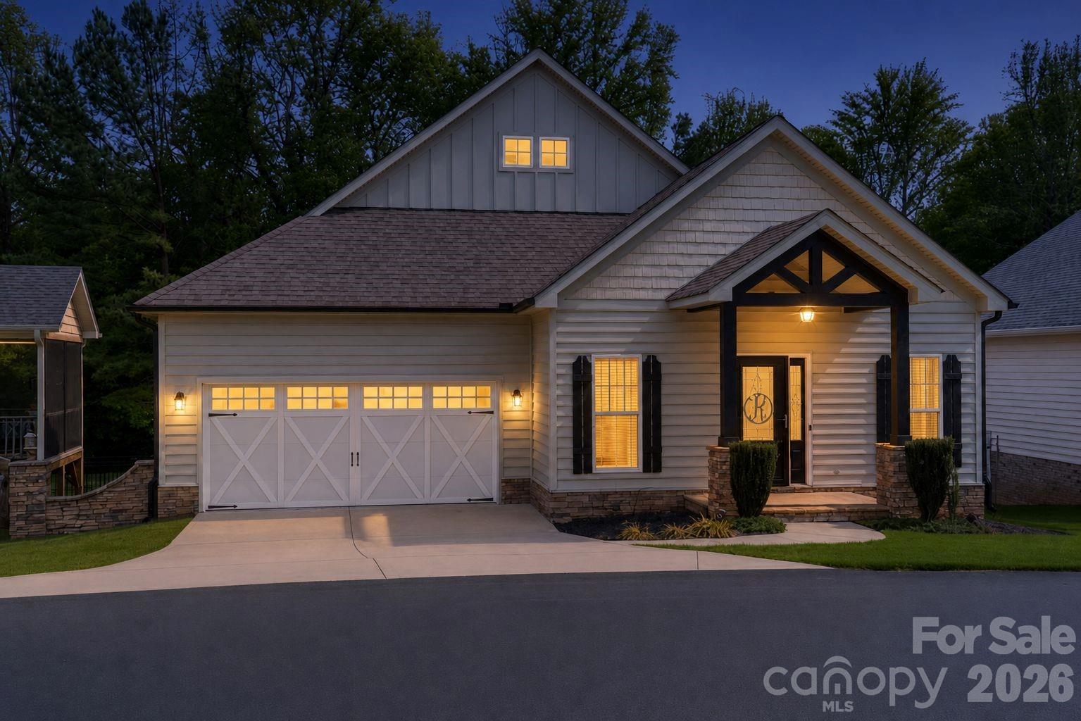 Experience the ideal blend of refined comfort and low-maintenance living in Charleston Place — one of the area's most sought-after 55+ active adult communities. This move-in-ready bungalow welcomes you with an open, functional floor plan defined by beautiful LVP flooring, granite countertops, and modern fixtures throughout. The central living room features a striking stone fireplace beneath an elegant tray ceiling, creating a warm and inviting focal point for quiet evenings or lively entertaining. The chef-inspired kitchen is perfectly appointed with modern cabinetry, granite countertops, ample counter space, a double oven, pantry storage, and a spacious breakfast area that flows naturally into the main living spaces. A versatile bonus room offers the flexibility needed for a dedicated home office, hobby space, or secondary den.
Outside, the transition to nature is seamless — step onto the deck, ideal for relaxing or hosting, with an additional patio overlooking a tranquil, tree-lined backyard that offers rare privacy. Practicality meets performance with an encapsulated crawl space that enhances energy efficiency and long-term value.
Perfectly positioned just minutes from the premier fairways of Red Bridge Golf & Country Club, local dining, shopping, and a winery — all just 35 minutes from Uptown Charlotte. The home is available to buyers under 55; however, this community has exceeded the threshold of 55+ residents to qualify for a HOPA exemption from fair housing familial status, meaning no one under 18 may reside in the home per the CCRs.