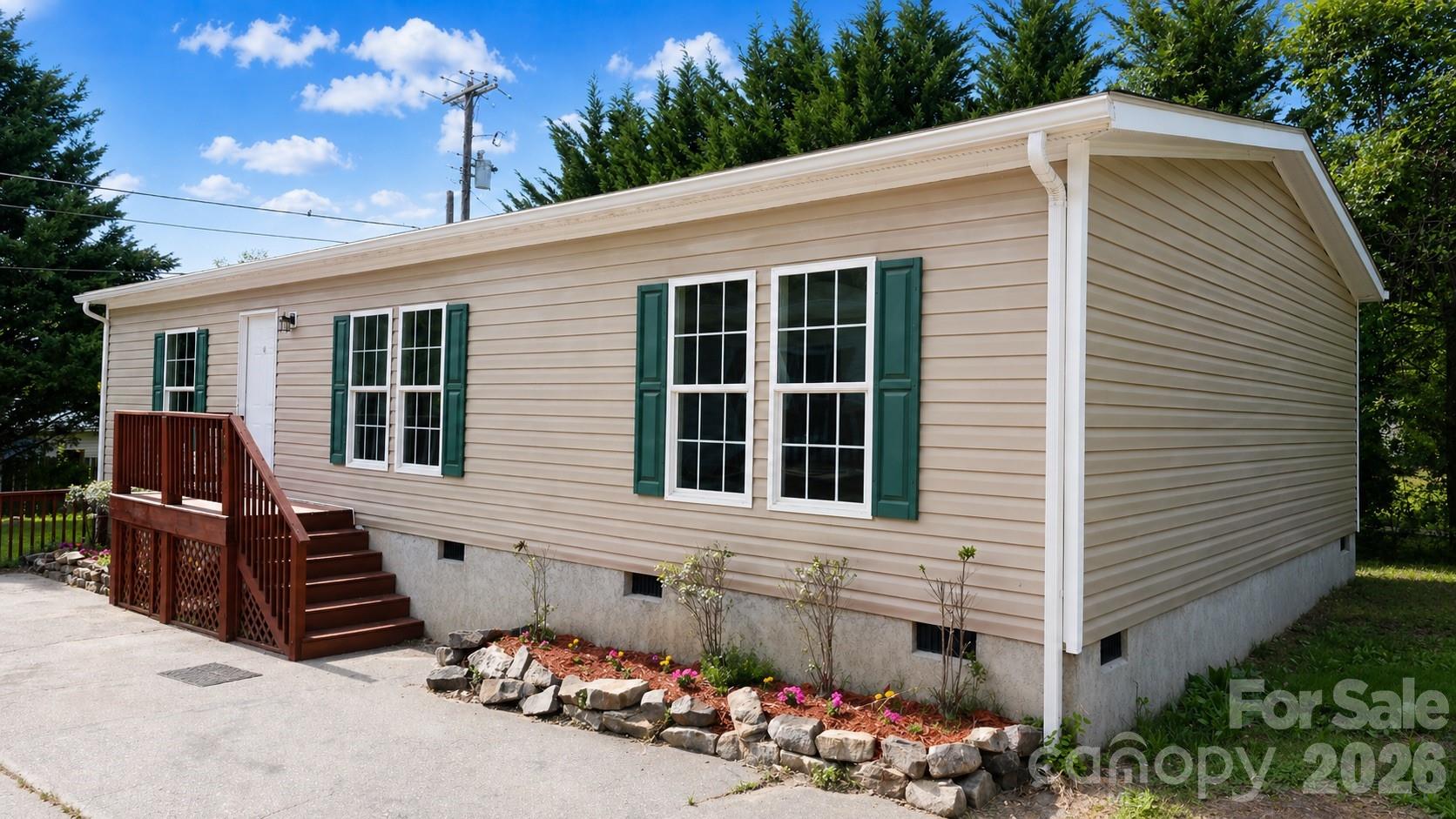 This updated 3 bedroom, 2 bathroom home is perfect for first time home buyers, families and investors alike. Untouched by Hurricane Helene this home offers an easy-living split-bedroom layout with modern interior finishes and a convenient location within walking distance of downtown Swannanoa, local restaurants, grocery options, and the planned Beacon Park / Beacon Bike Park redevelopment at the former Beacon Blanket Factory site. Interior features include recessed lighting, luxury vinyl plank flooring, stainless steel kitchen appliances, butcher block counters, and a primary suite with private bath and walk-in closet. The fenced yard offers usable outdoor space for pets, gardening, or relaxing at home. With quick access to main routes toward Asheville and Black Mountain, this home pairs everyday convenience with one of Swannanoa’s most exciting revitalization areas. City is in the process of putting in all brand new water lines throughout the area and connecting to the home allowing for peace of mind to the quality and infrastructure to city water.