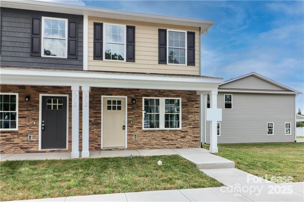 3 bedroom / 1.5 bathroom END UNIT townhome for rent in Hickory, NC! Features a living room and an open concept, a natural finished kitchen with white cabinets, granite countertops, and stainless steel appliances, includes a refrigerator, bar seating, and a breakfast area. There is a half bath on the main level and three bedrooms along with a full bath on the upper floor. Stackable Washer and Dryer in Laundry Room...Sitting in a great location and is close to schools, restaurants, a park, grocery stores, and I-40.