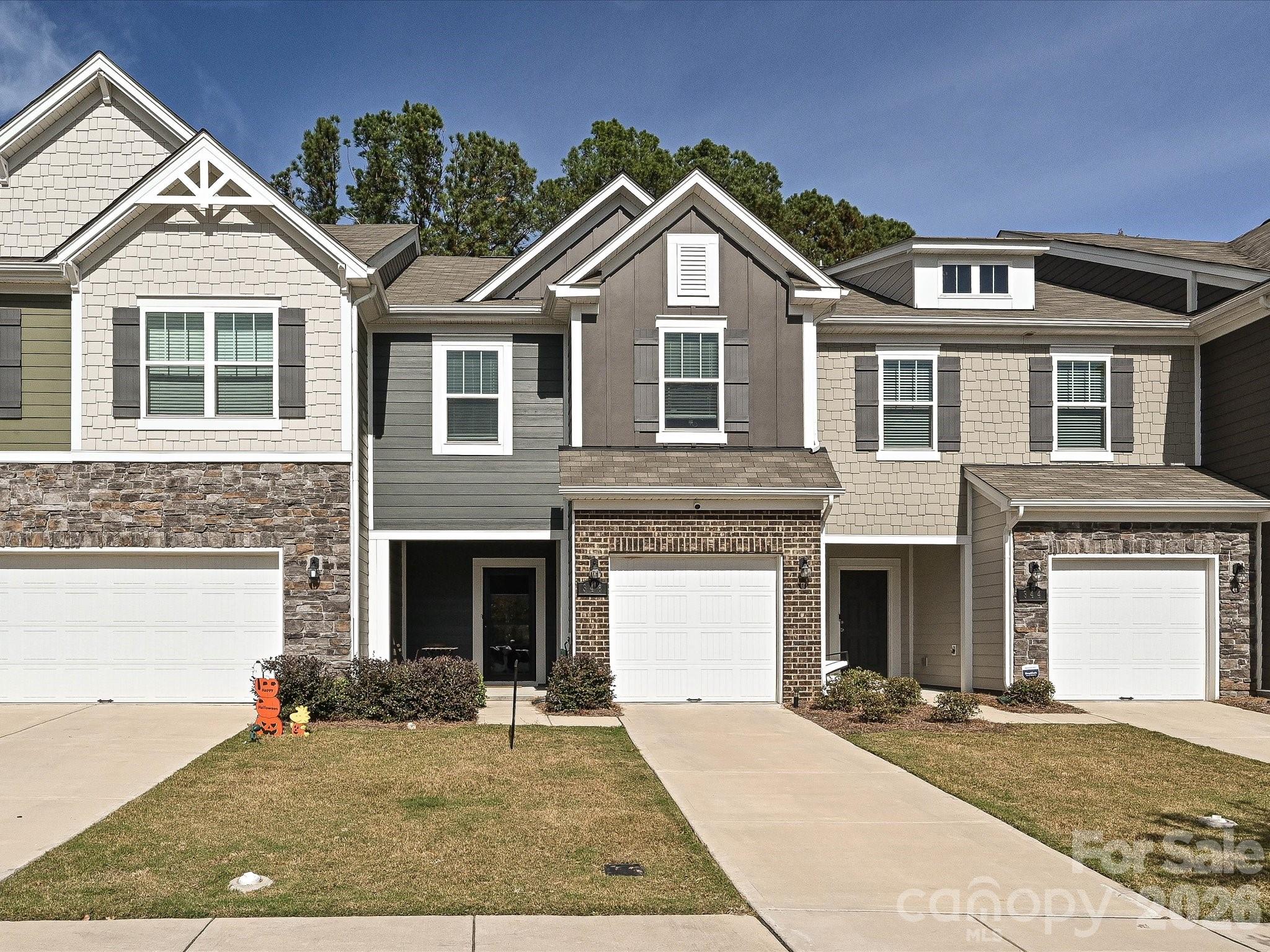 " Motivated Seller " Built in 2023, this Immaculate, 3 bedroom, 2.5 bath townhouse in Harpers Run! Modern look throughout the main level including an open concept kitchen, dining area and living room that look out to the back patio. The kitchen features Granite countertops, stainless steel appliances, an oversize island with breakfast bar, and a subway tile backsplash. The upstairs includes a Master Suite with walk-in closet, tray ceiling, walk-in tiled shower and dual vanity sinks with quartz countertops. There are two other bedrooms, a full bath, and the laundry room on the upper level as well. Conveniently located close to Matthews and within 30 minutes to uptown Charlotte.